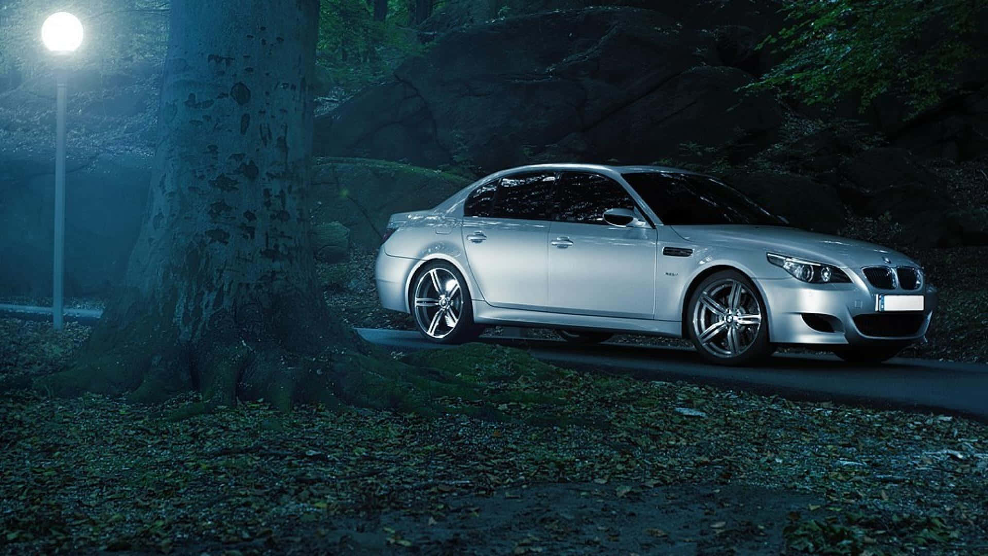 Sleek BMW M5 Sport Sedan in Action Wallpaper