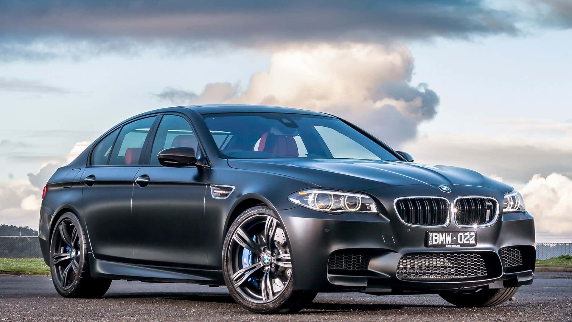 A sleek and powerful BMW M5 in action Wallpaper