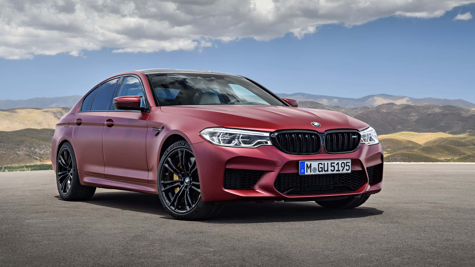 Luxurious BMW M5 in Stunning Blue Wallpaper