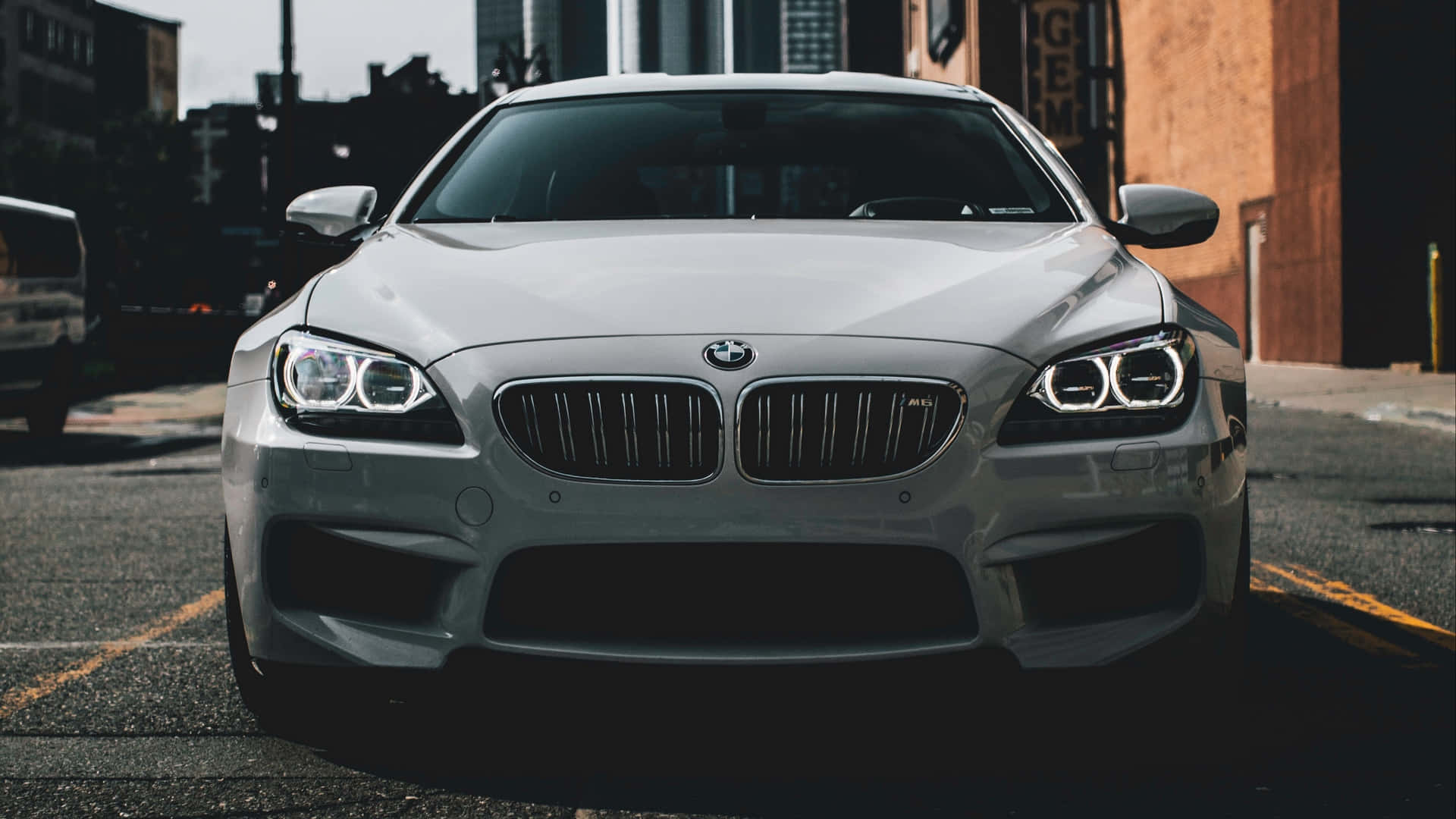 Caption: Sleek BMW M6 in Motion Wallpaper