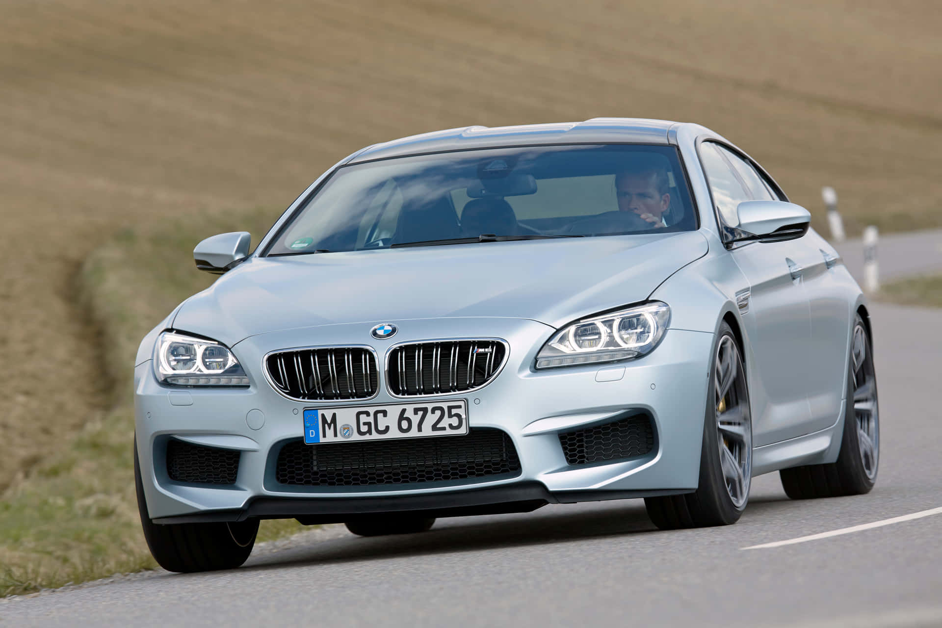 Captivating BMW M6 on the Road Wallpaper
