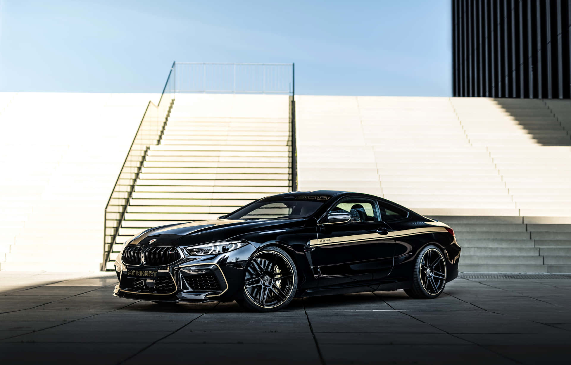 Experience the thrill of driving a BMW M8 Wallpaper