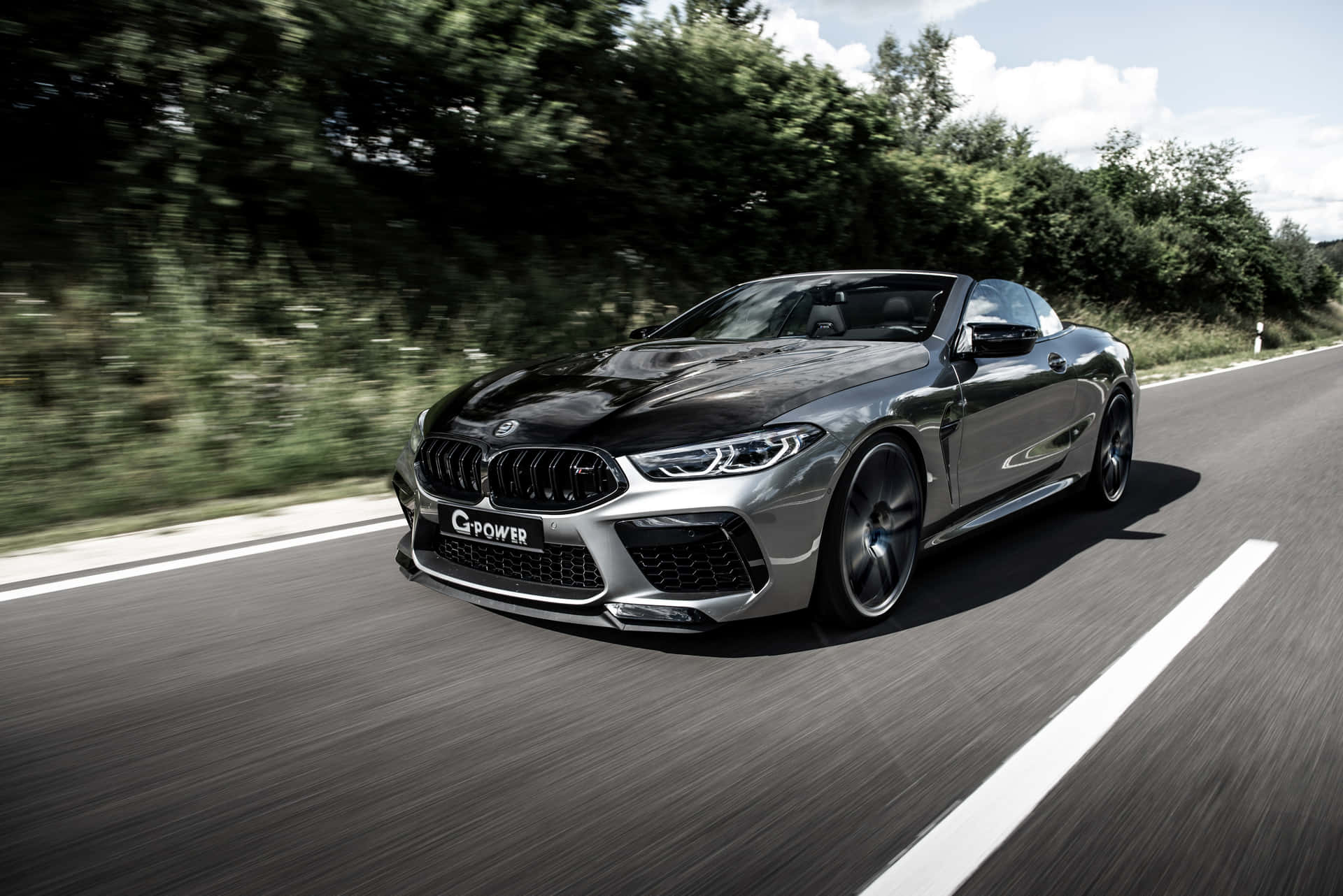 Silver-gray Bmw M8 On The Road 4k Wallpaper