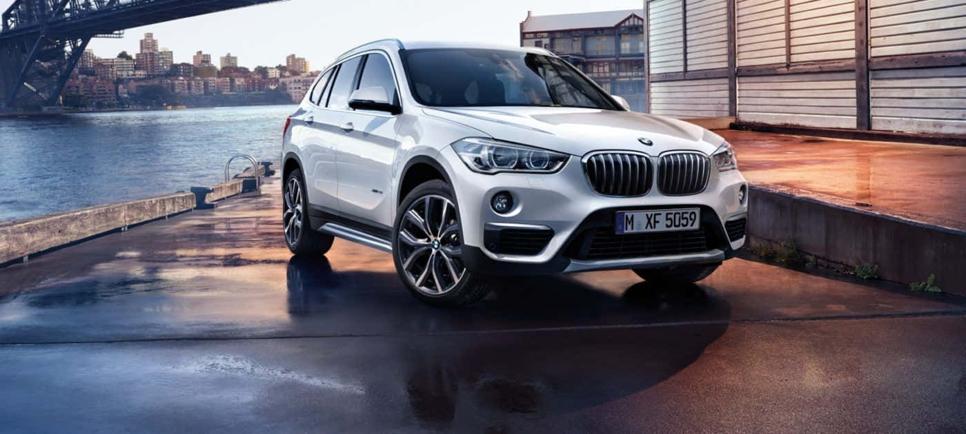 Dynamic BMW X1 on the Road Wallpaper