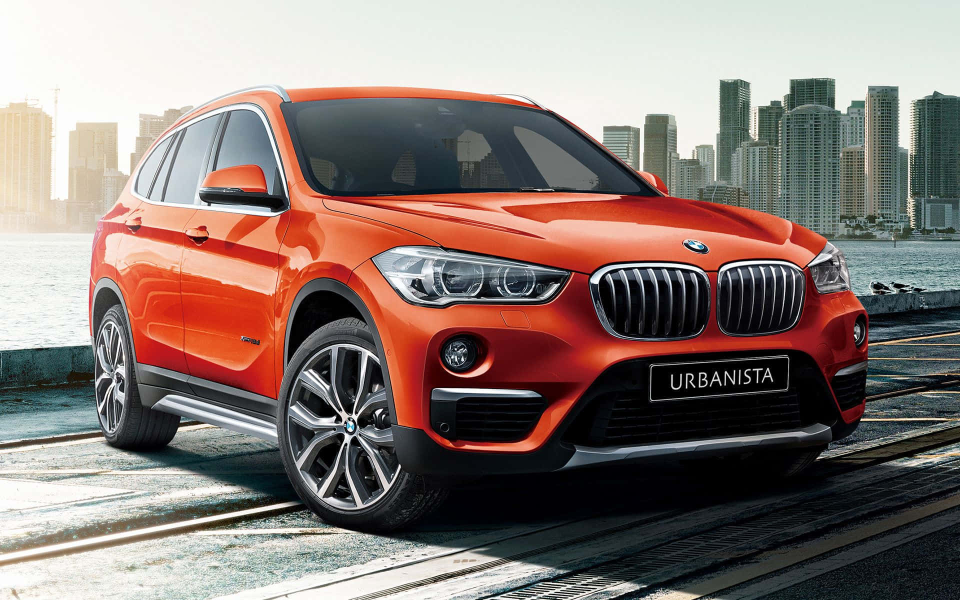 Sleek BMW X1 on an open road Wallpaper