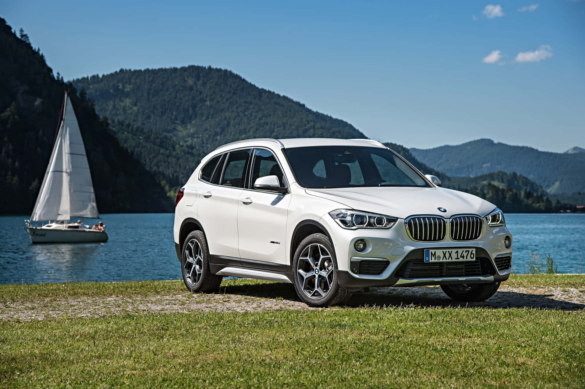 Sleek BMW X1 Cruising on the Open Road Wallpaper