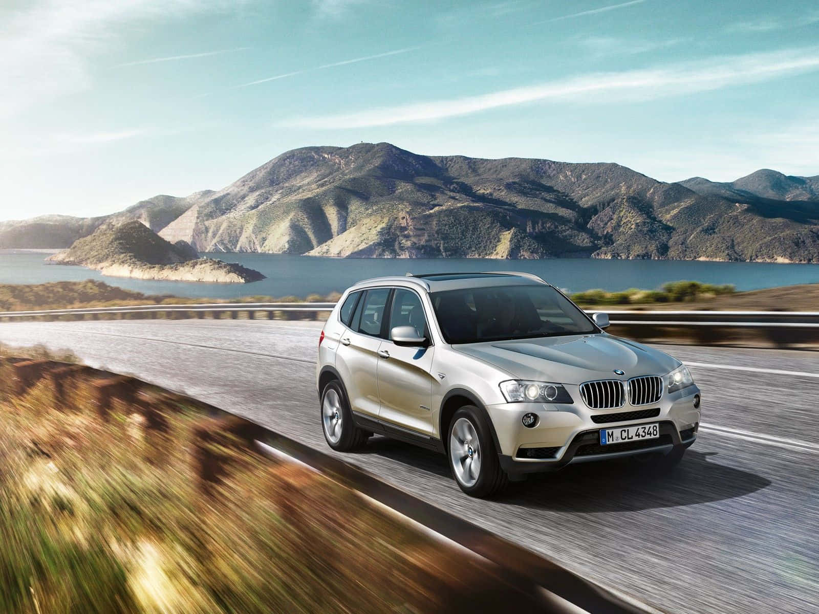 Caption: Powerful BMW X3 in Action Wallpaper