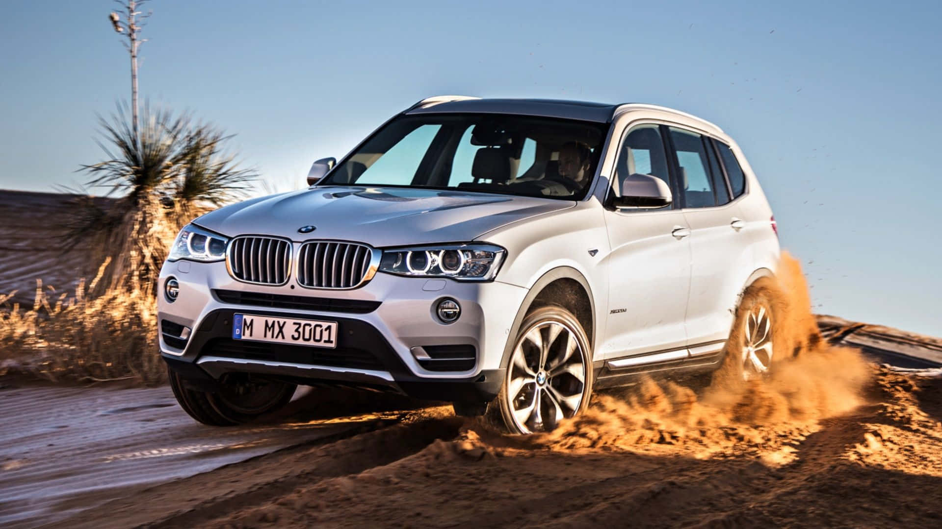 Sleek and Stylish BMW X3 SUV in Action Wallpaper
