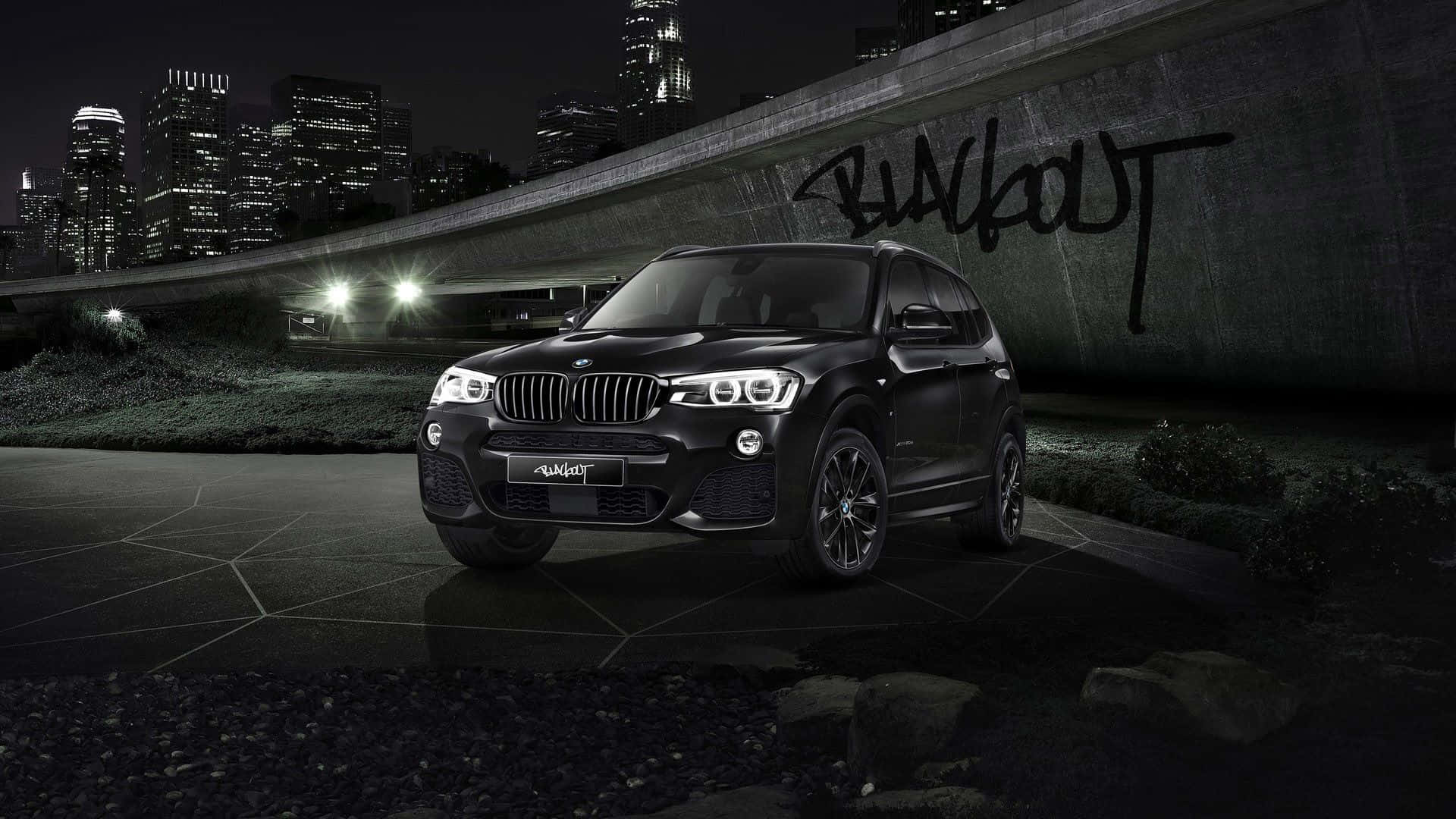 Luxurious BMW X3 in a Stunning Setting Wallpaper