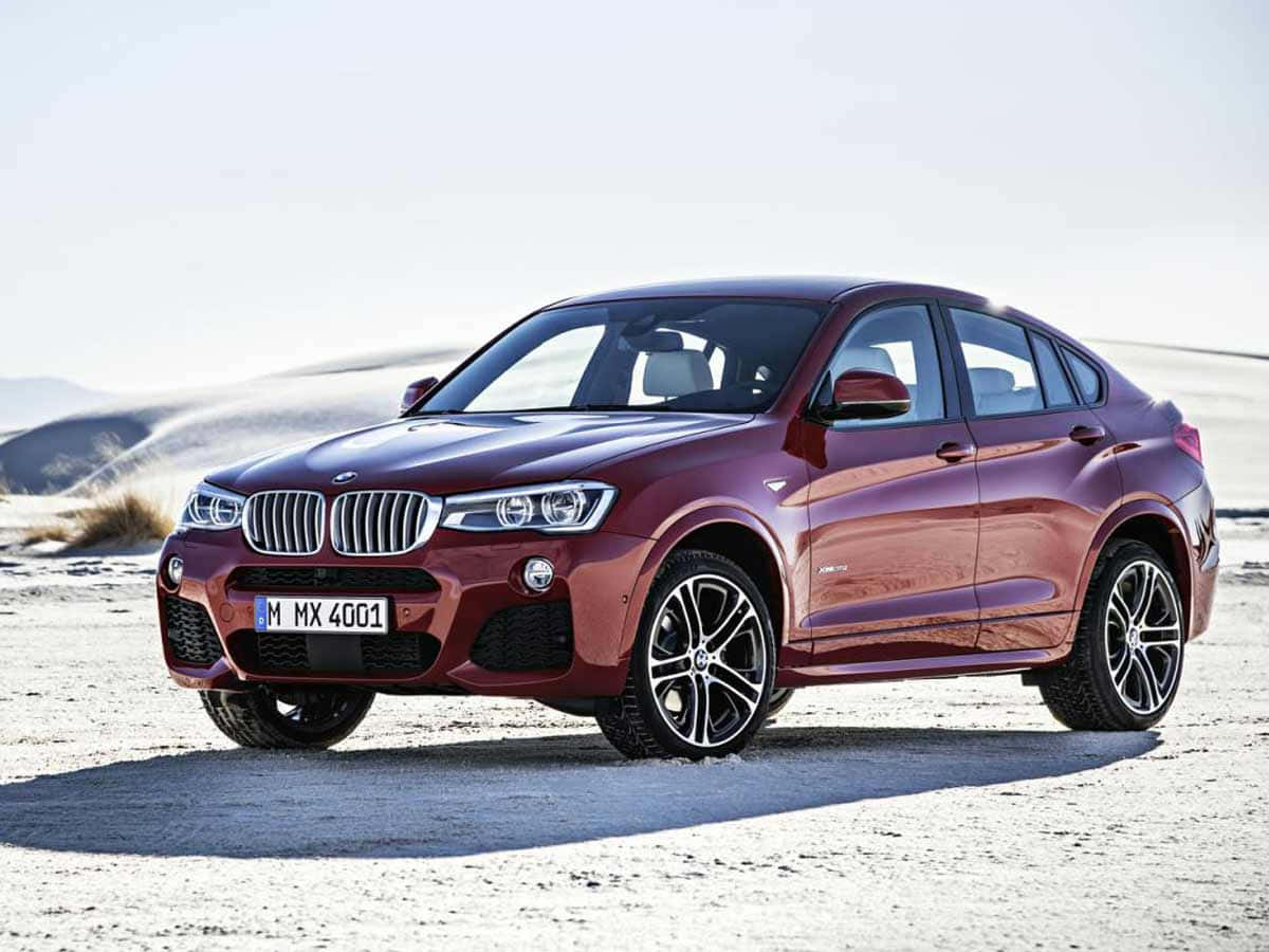 Experience elegance on wheels with the stunning BMW X4. Wallpaper