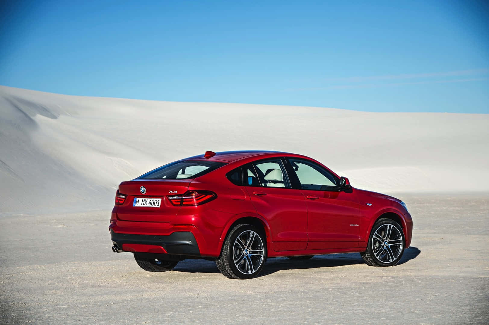 Sleek and Stylish BMW X4 in Motion Wallpaper