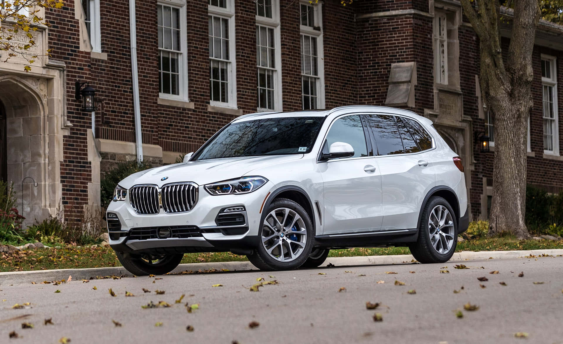 Sleek BMW X5 in urban setting Wallpaper