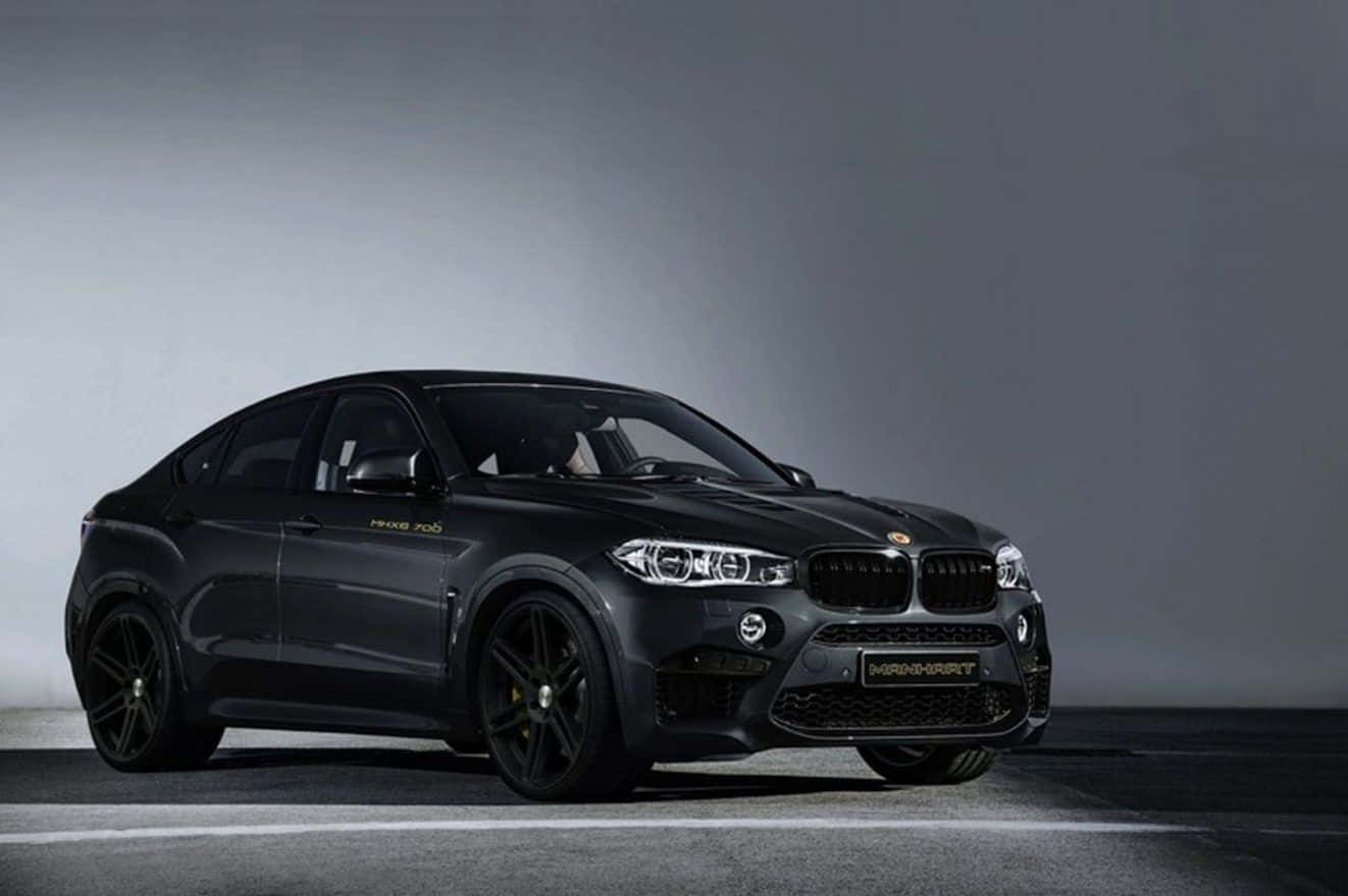 Sleek BMW X6 in Motion Wallpaper