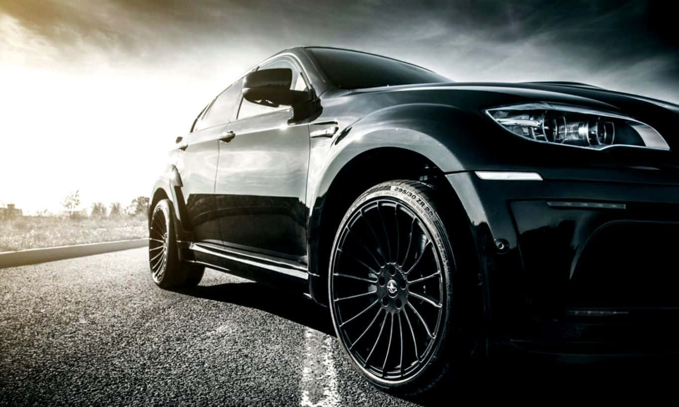 The stylish and luxurious BMW X6 in motion Wallpaper