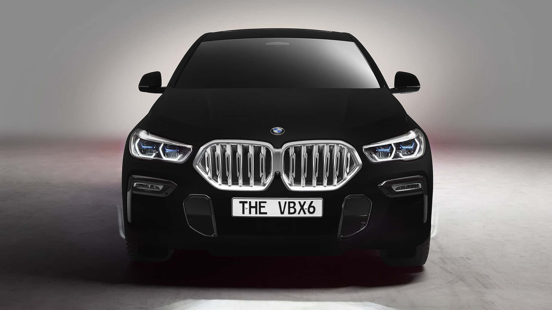 Sleek and Powerful BMW X6 in High-Resolution Wallpaper Wallpaper