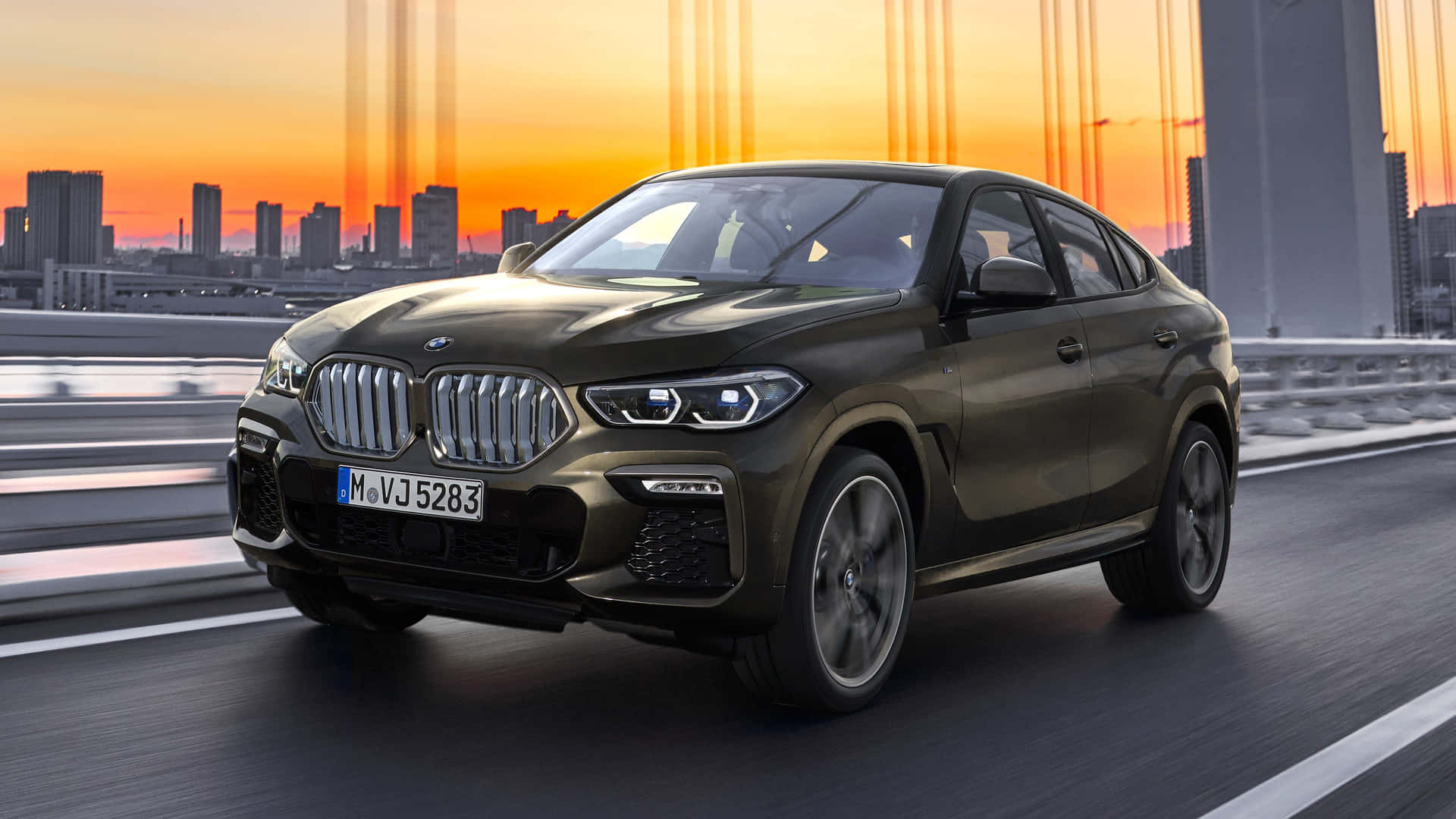 Captivating BMW X6 With Sleek Design and Powerful Stance Wallpaper