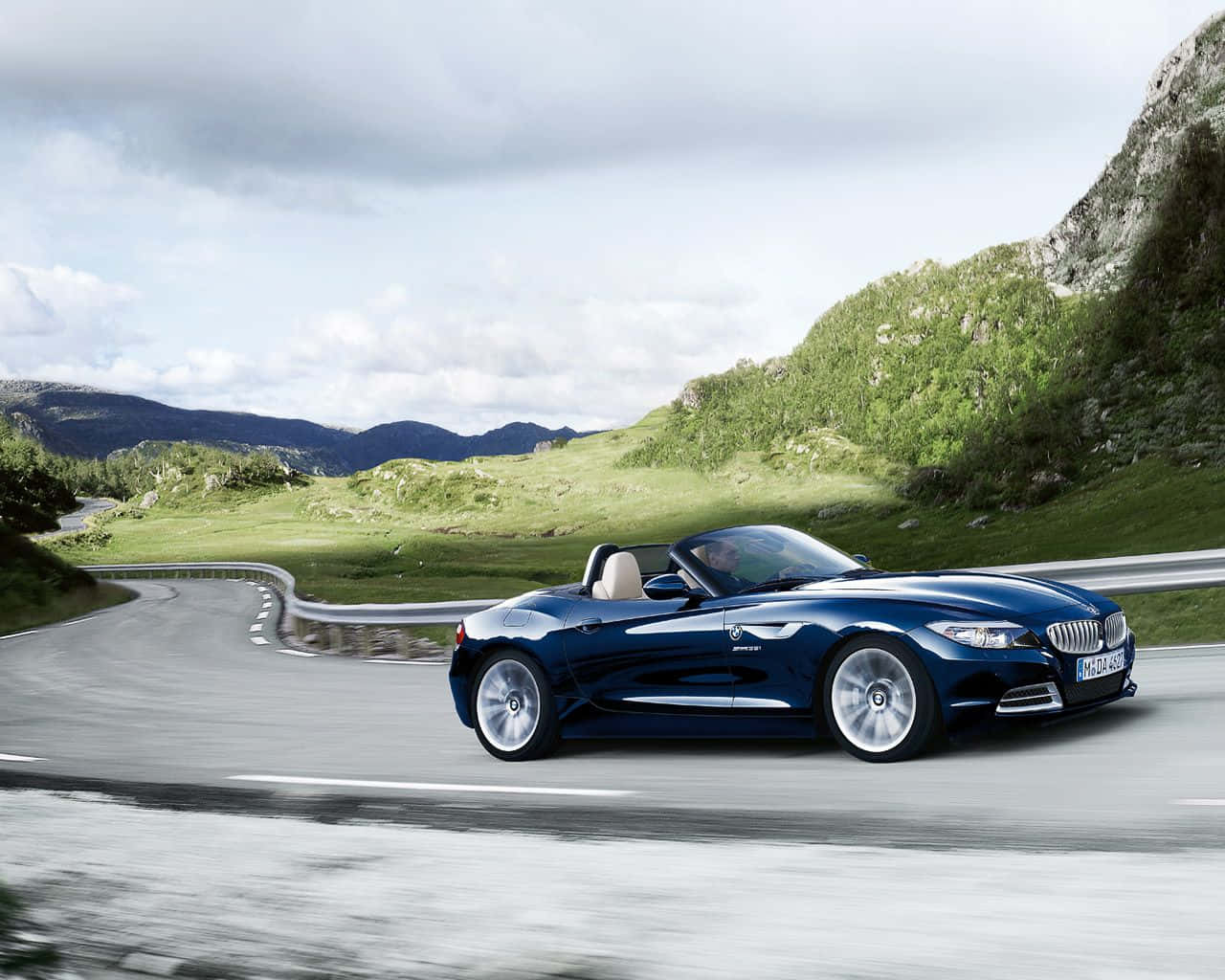 Experience the Thrill with the Stylish BMW Z4 Roadster Wallpaper