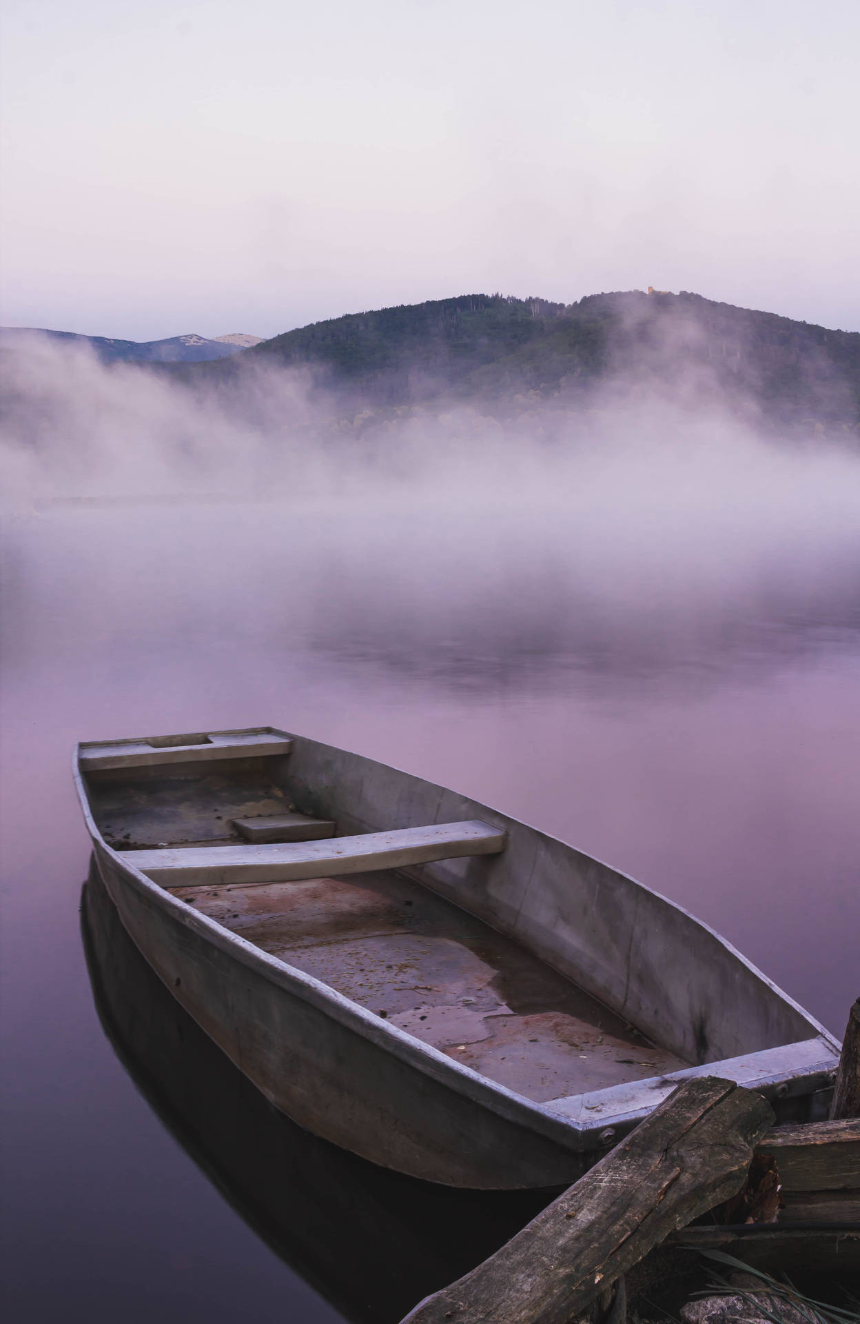 Boat On A Foggy Lake Wallpaper
