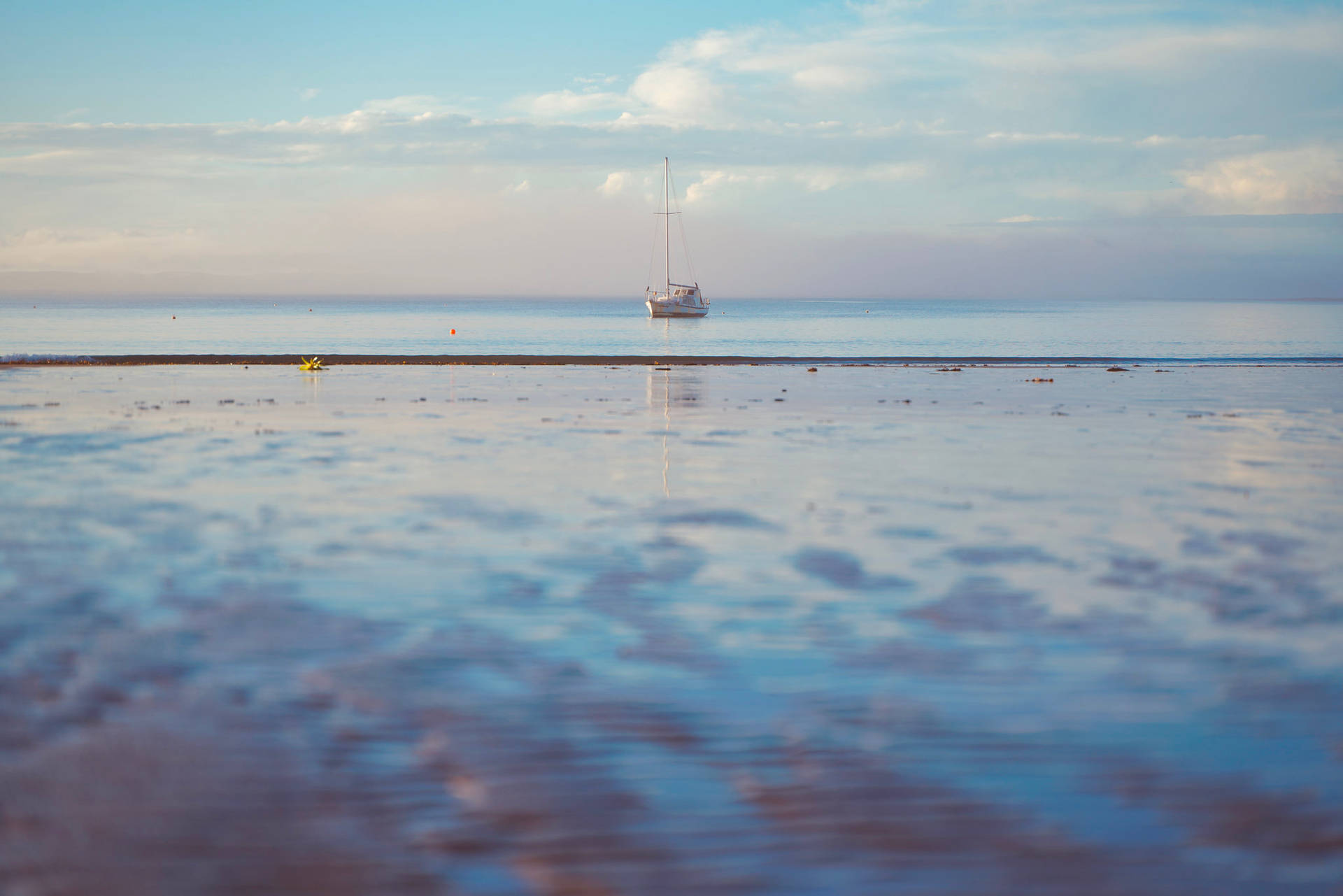 Boat Silhouette During Low Tide Wallpaper