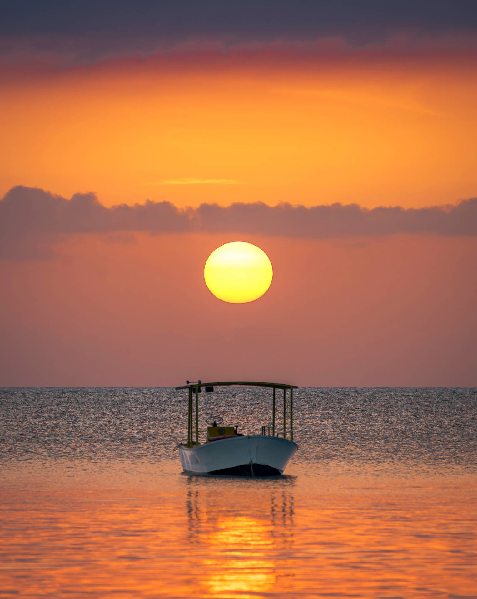 Boat With A Sun In The Horizon Wallpaper