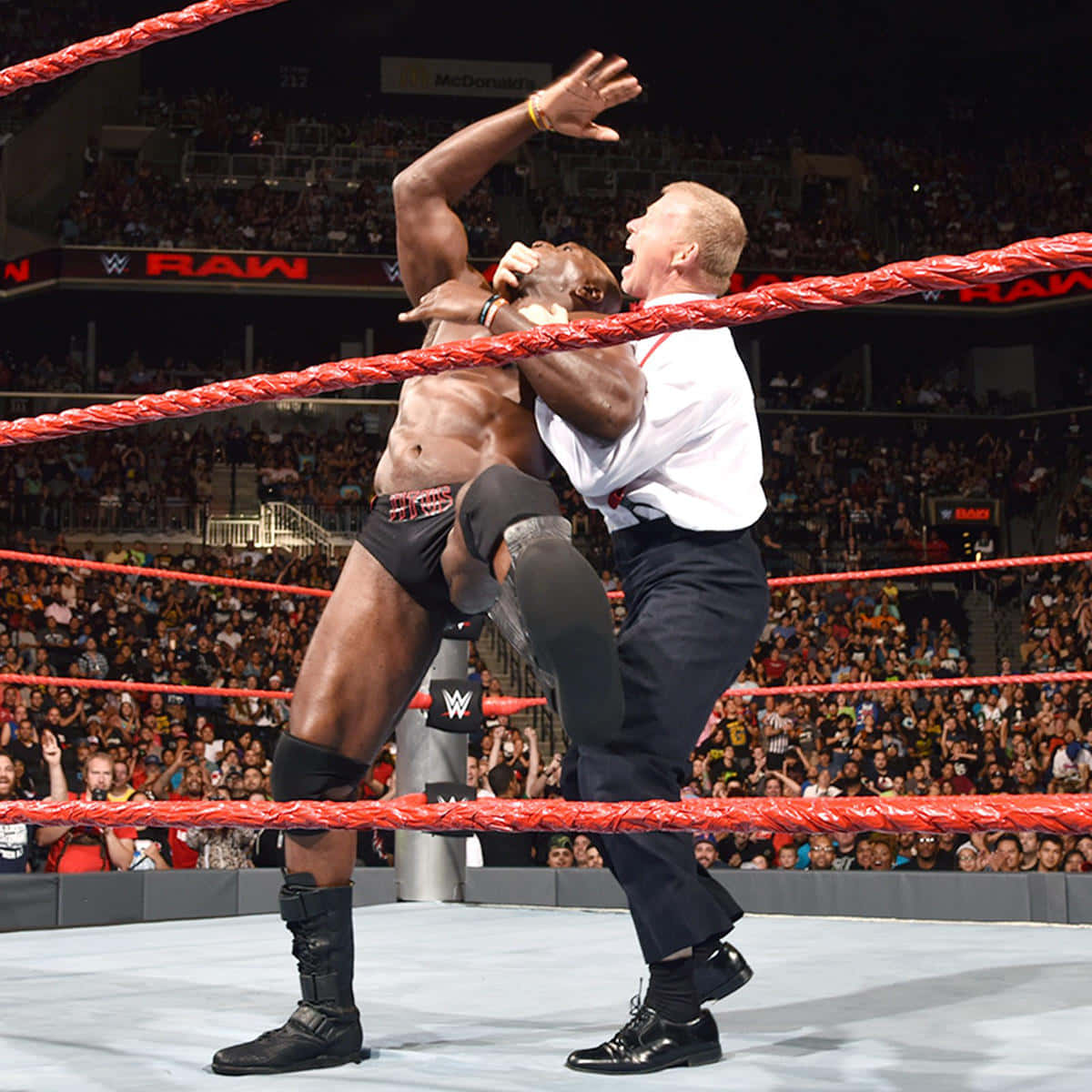 Bob Backlund Attacking Titus O'neil Wwe Raw Wallpaper