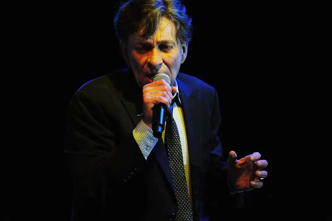 Bobby Caldwell Performing Live On Stage Wallpaper