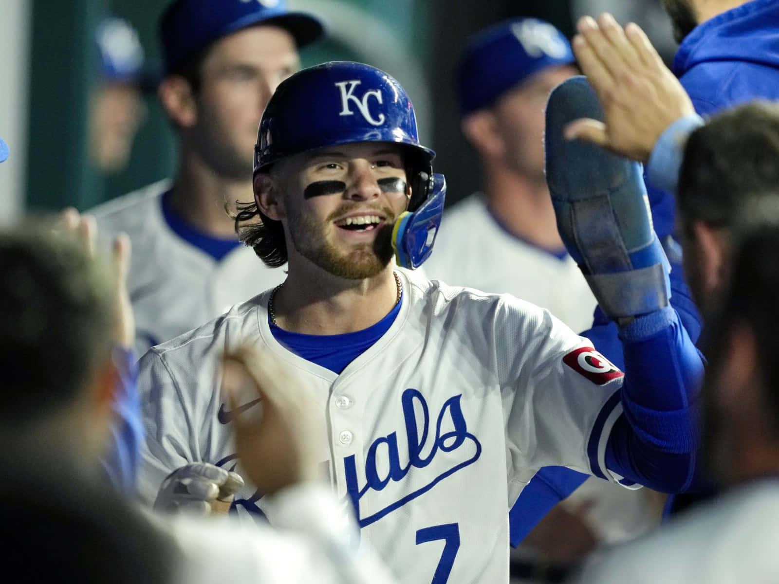 Bobby Witt Jr Celebratingwith Team Kansas City Royals Wallpaper