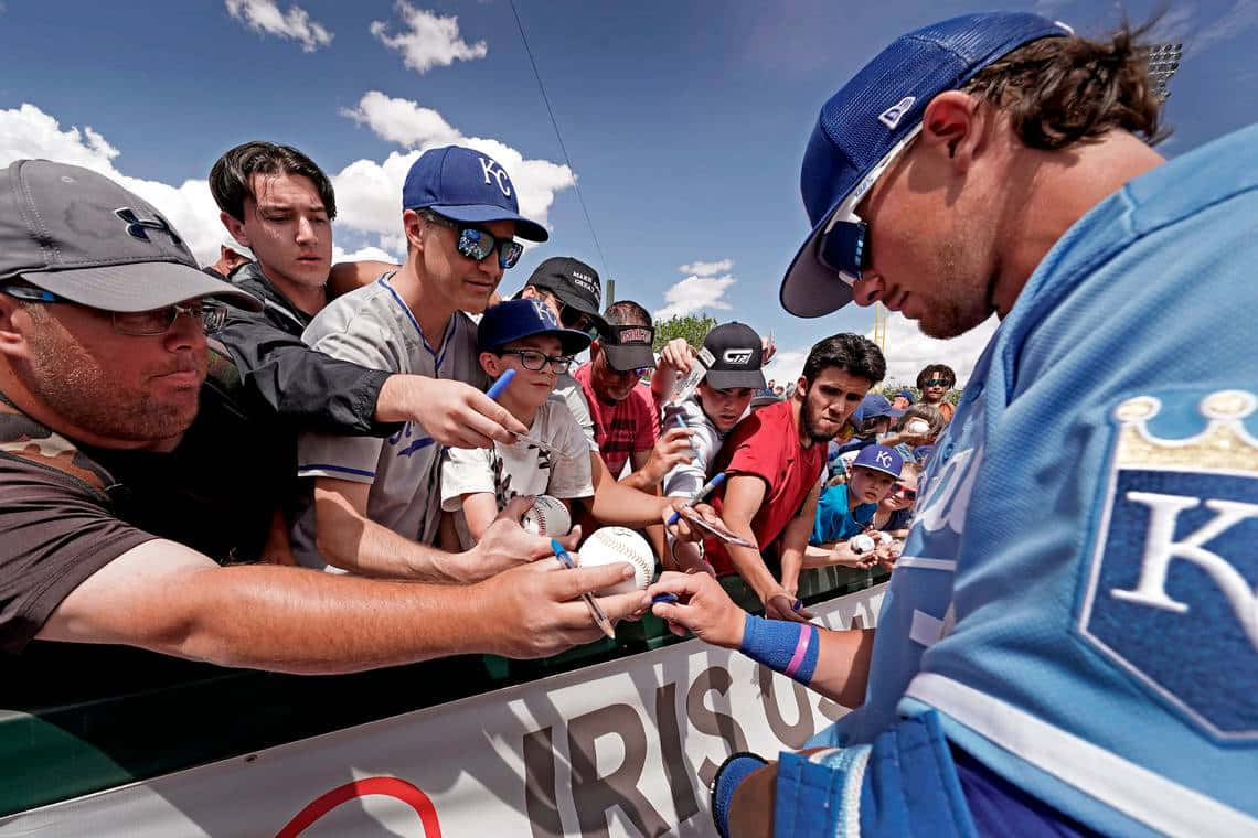 Bobby Witt Jr Signing Autographsfor Fans Wallpaper