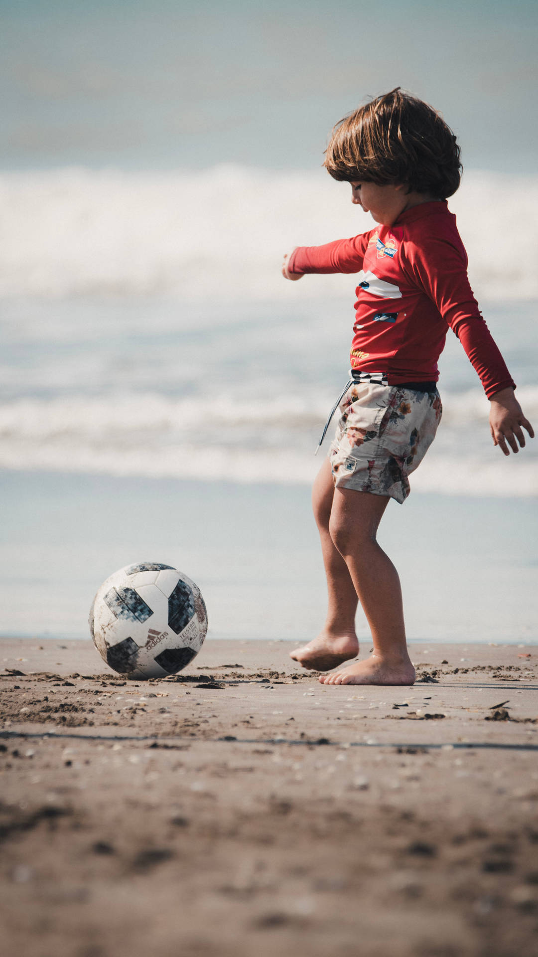 Bocce-bold barn spiller på stranden Wallpaper