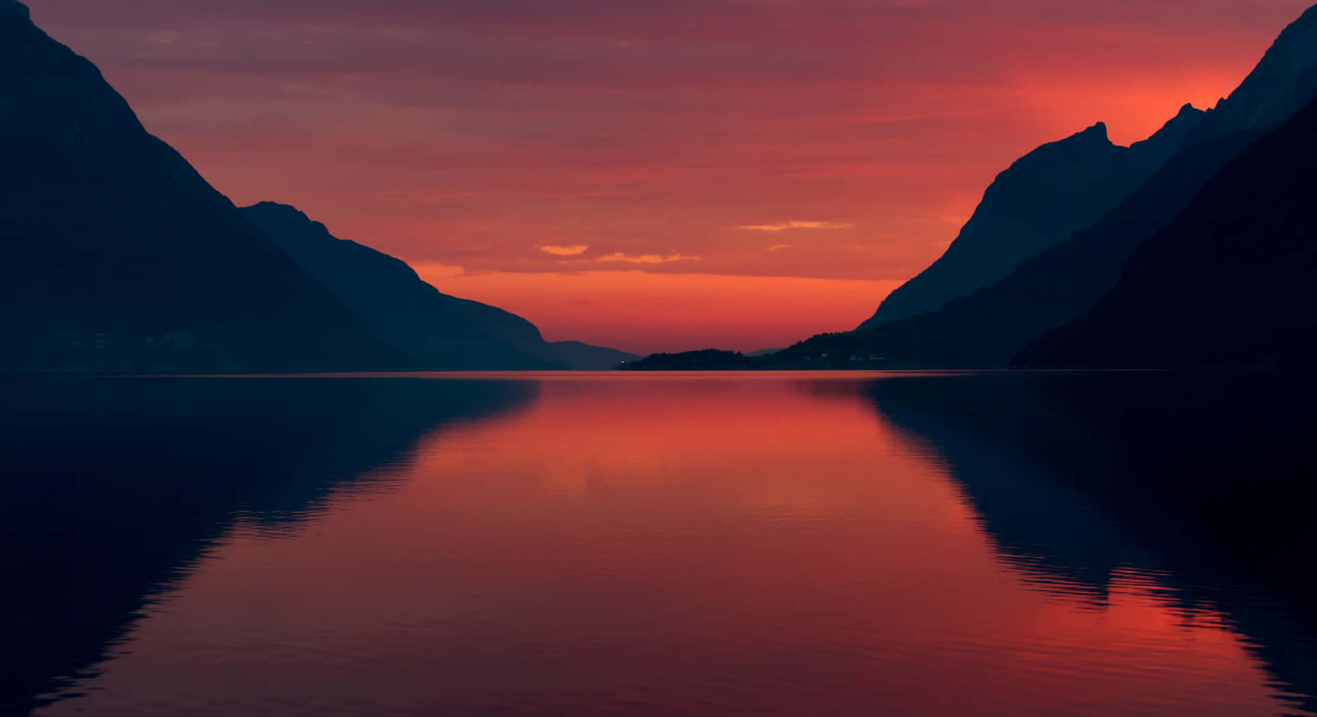 Body Of Water With Mountains Under Evening Sky Wallpaper