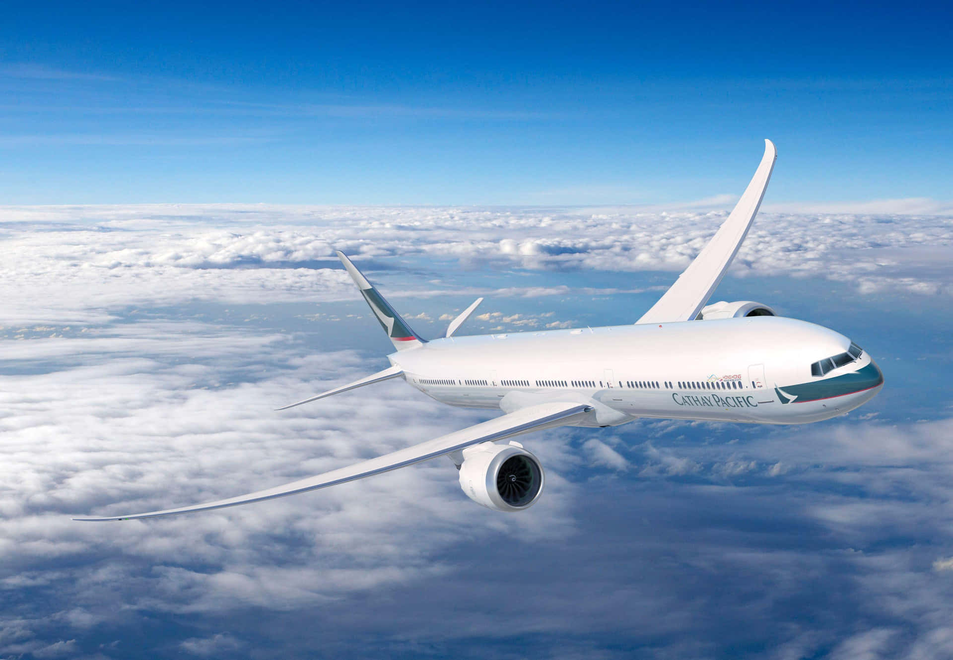 Boeing Aircraft In Flight Over Clouds Wallpaper