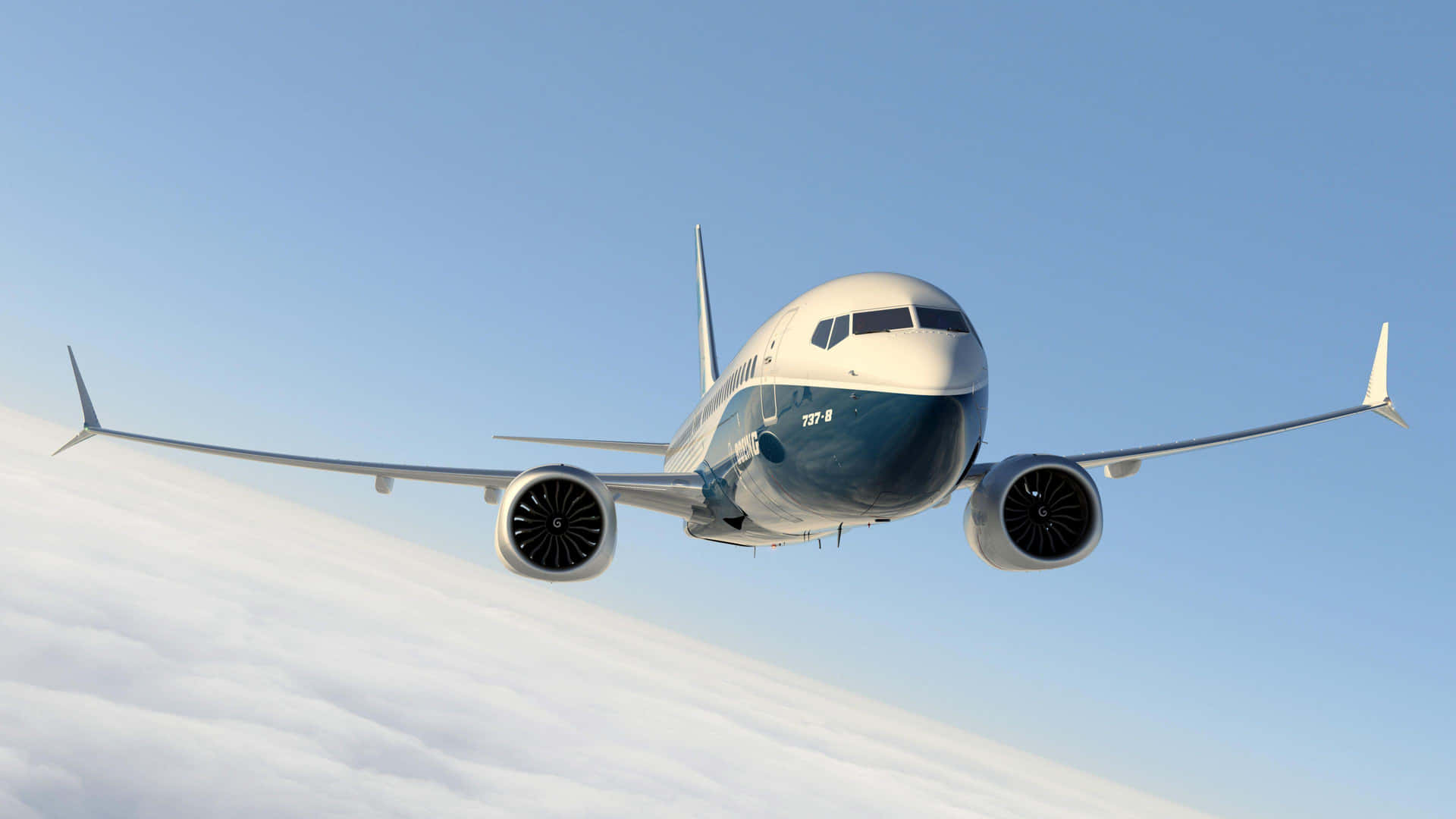 Boeing737 Midflight Over Clouds Wallpaper