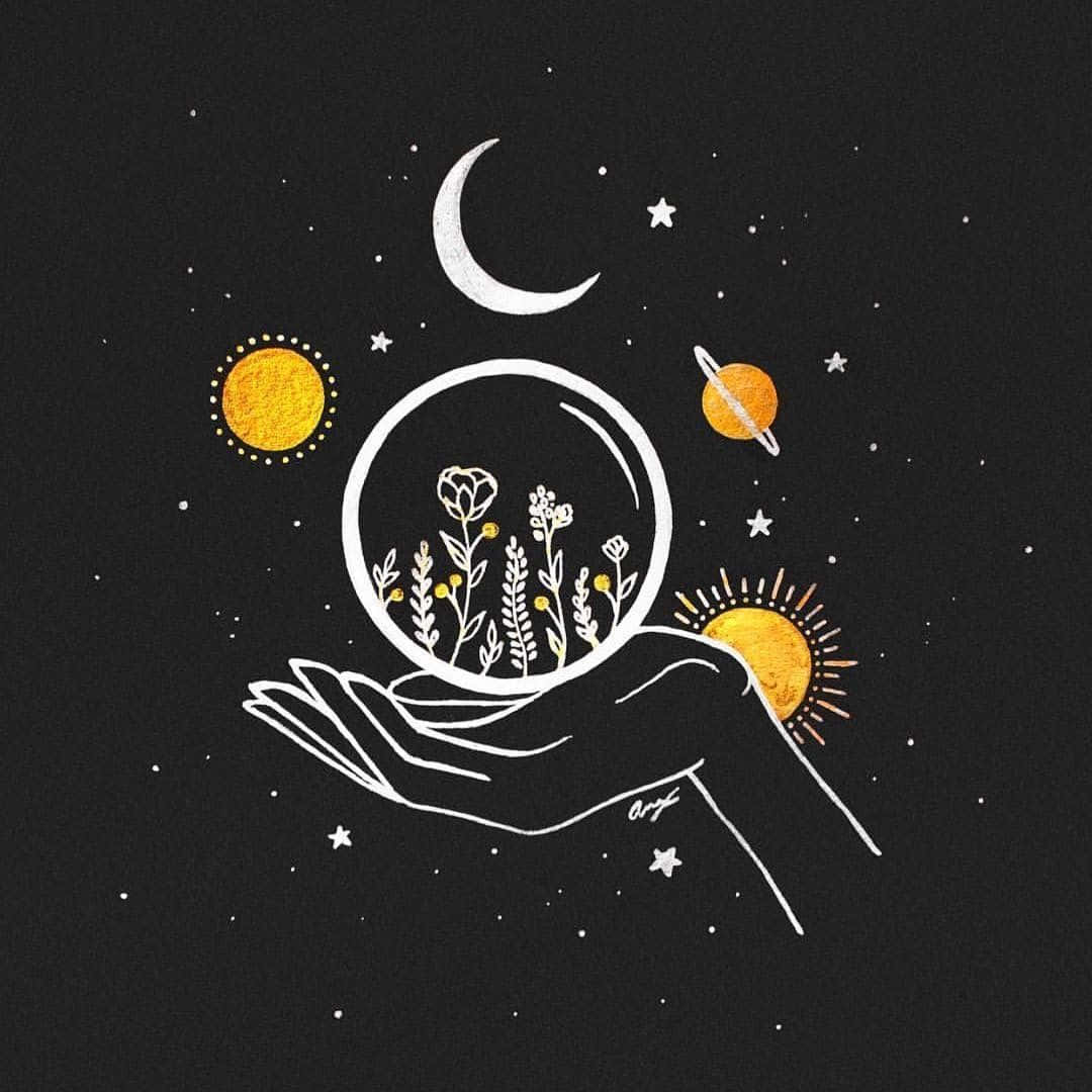 A Hand Holding A Glass Ball With Stars And Planets Wallpaper