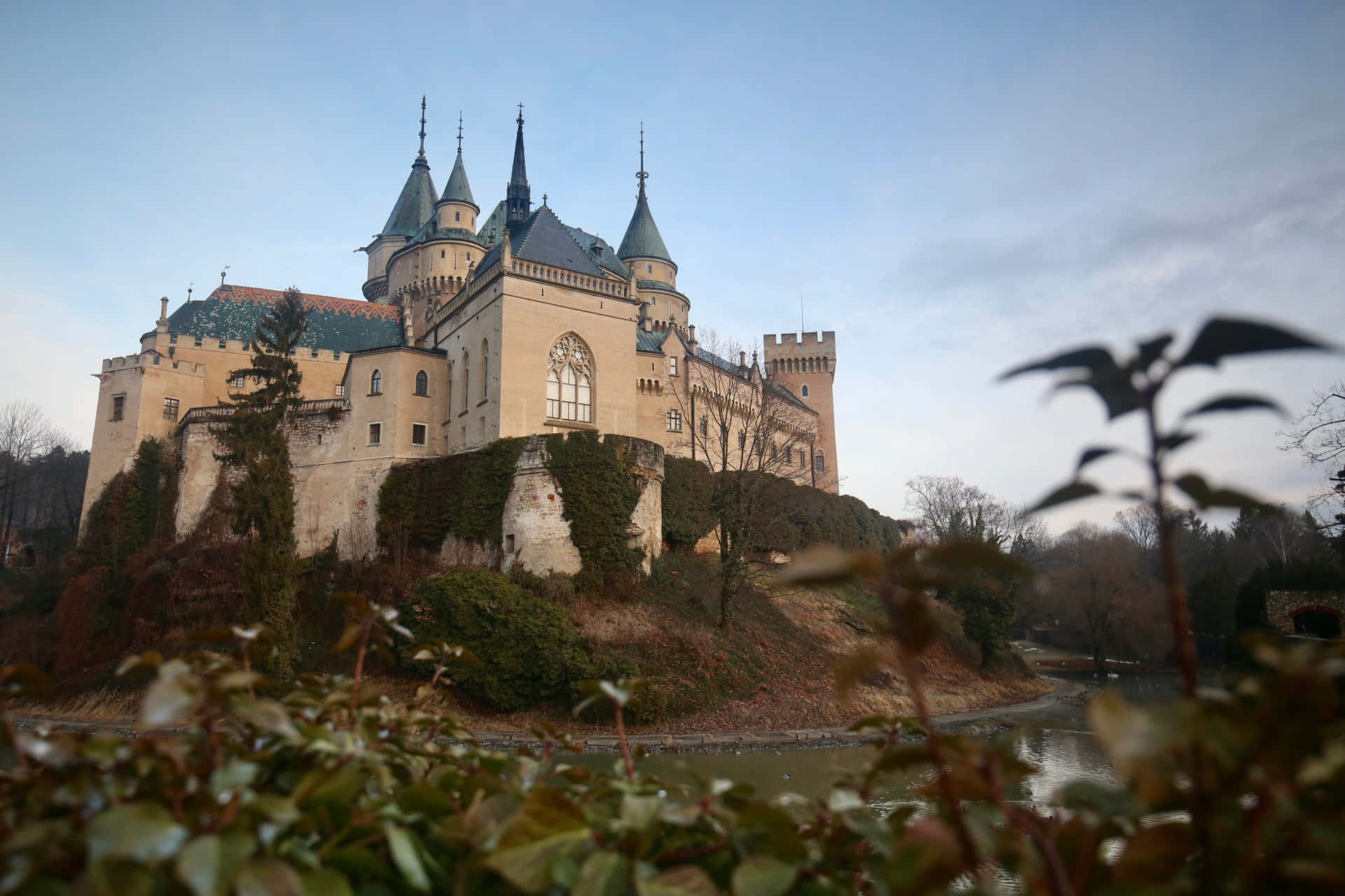 Bojnice Castle From Below With Plants Wallpaper