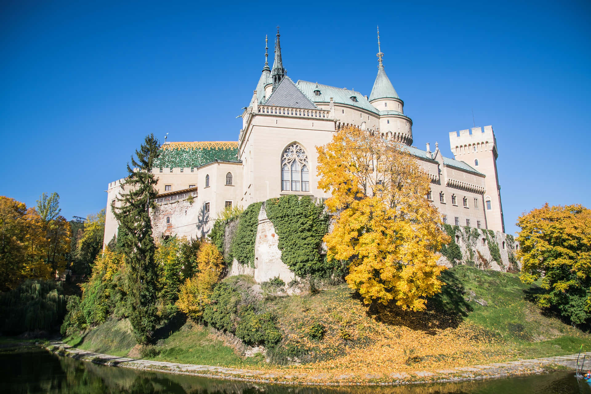 Majestic Bojnice Castle Amidst Verdant Nature Wallpaper