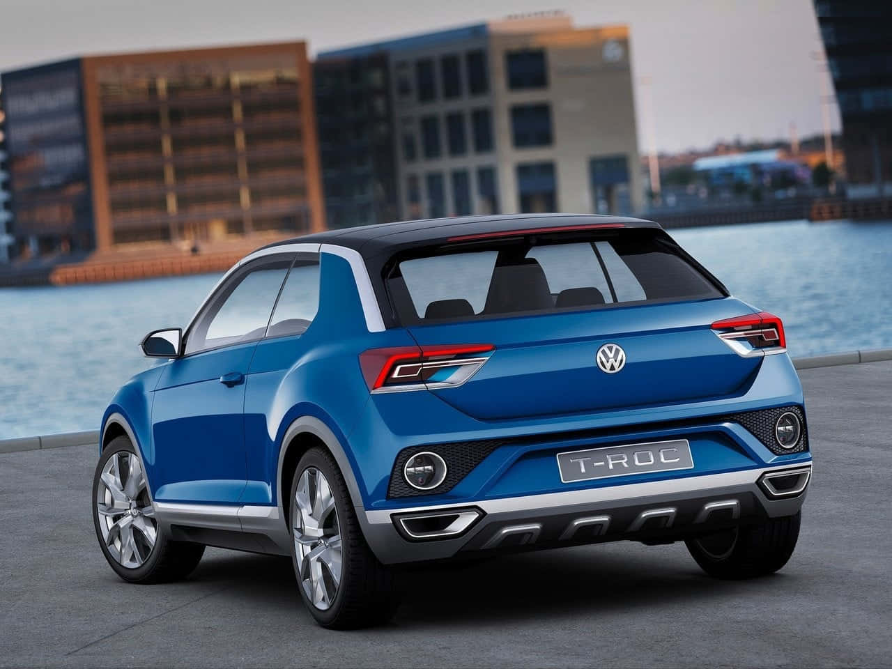 Bold And High-performance Volkswagen T-roc On The Highway Wallpaper