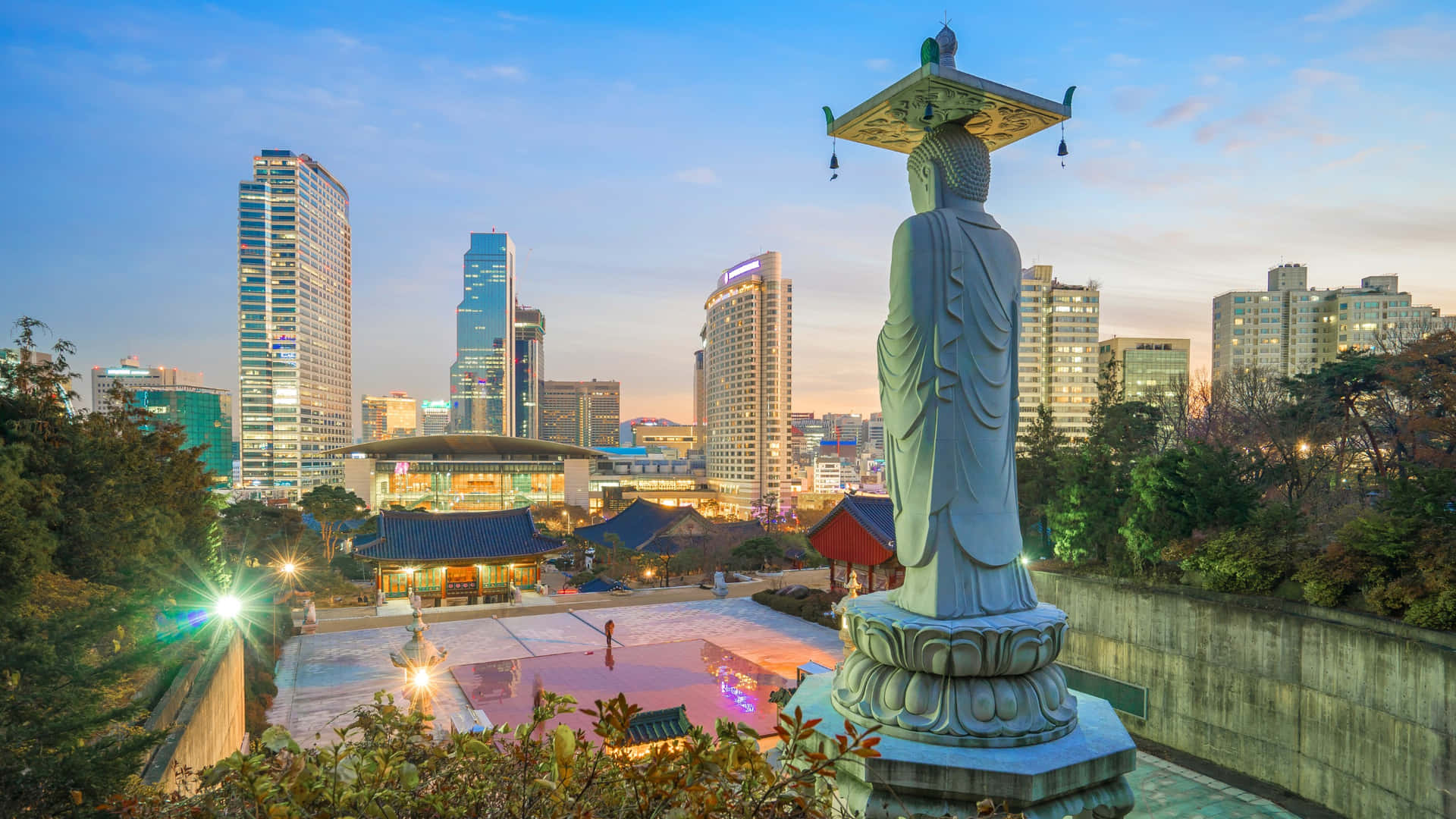 Bongeunsa Temple Statue Overlooking Seoul Skyline Wallpaper