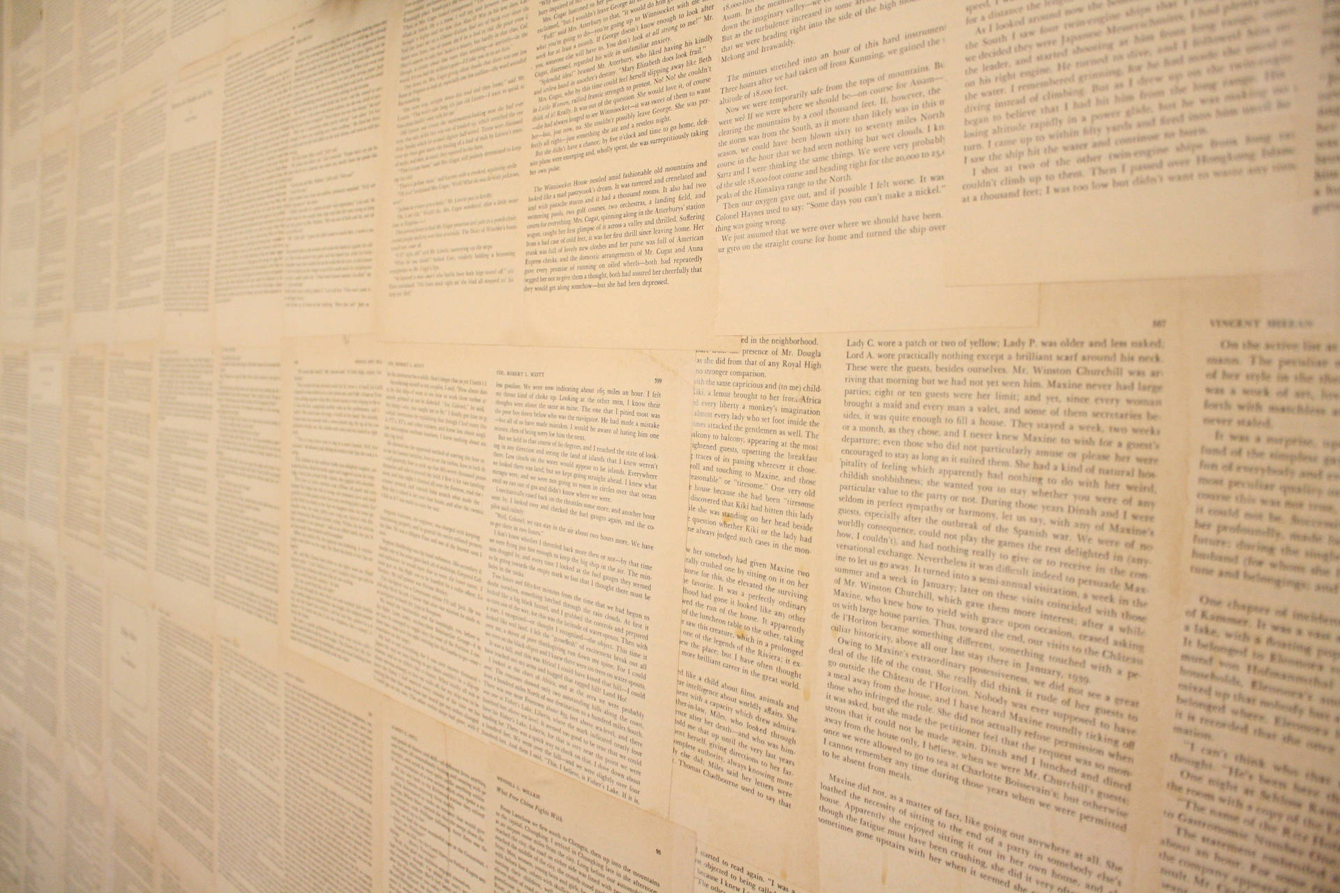 Book pages used as a wall decoration wallpaper