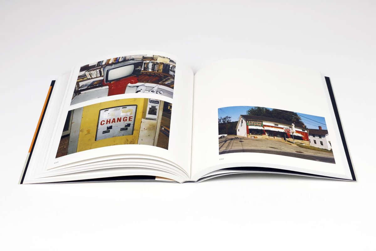 A Book With Pictures Of A Store And A Car