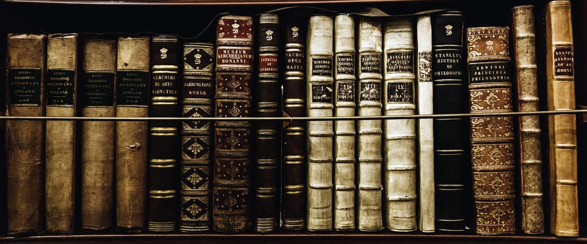 A Row Of Books On A Shelf