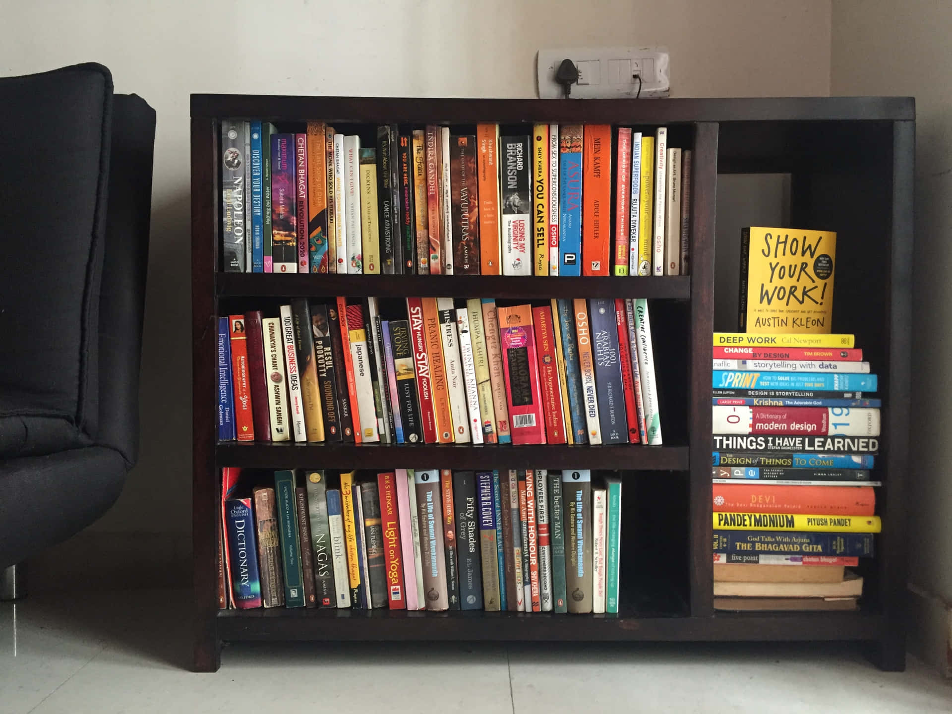 A Book Shelf With Books On It