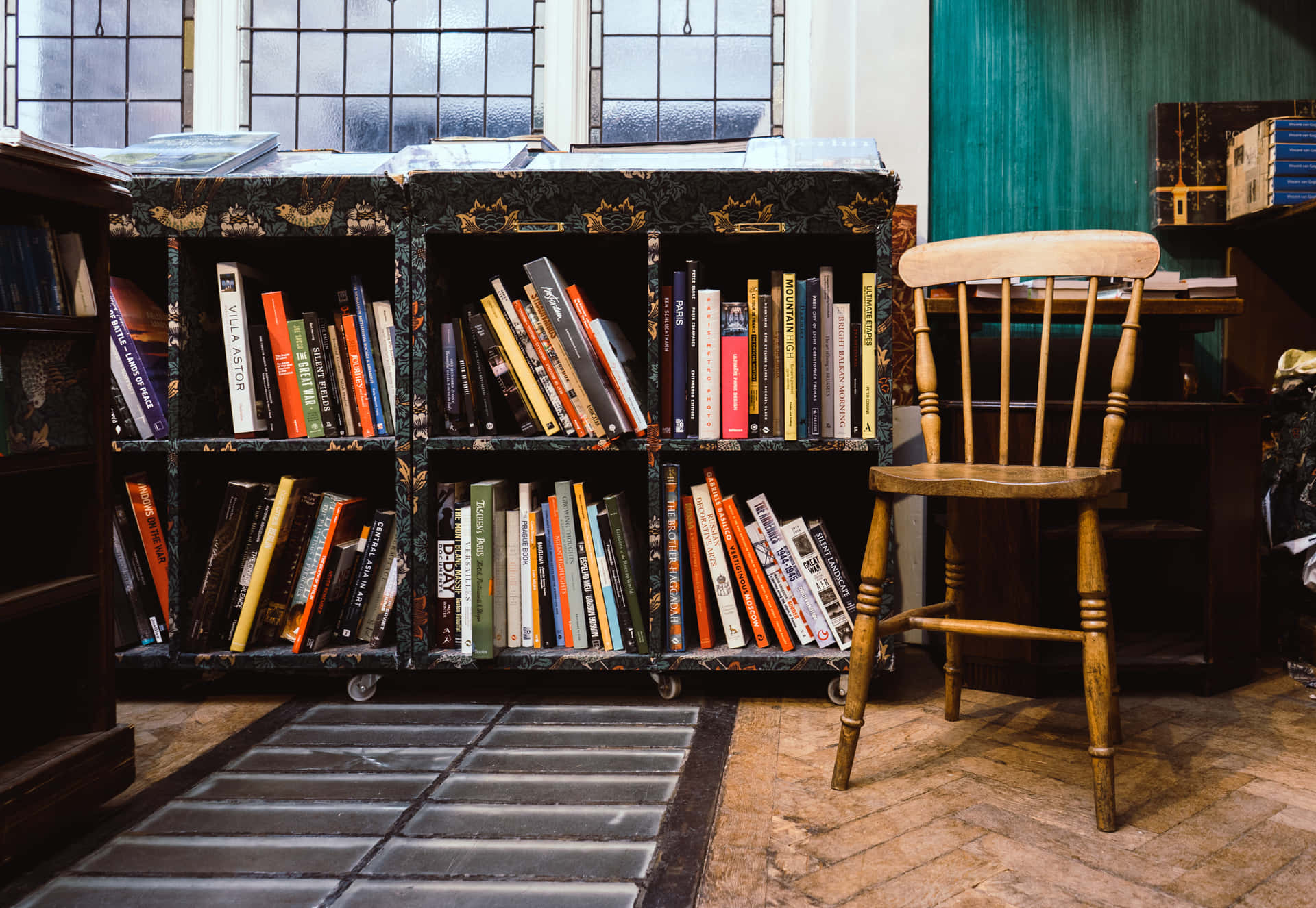 A Creative Workspace with a Cozy Bookshelf