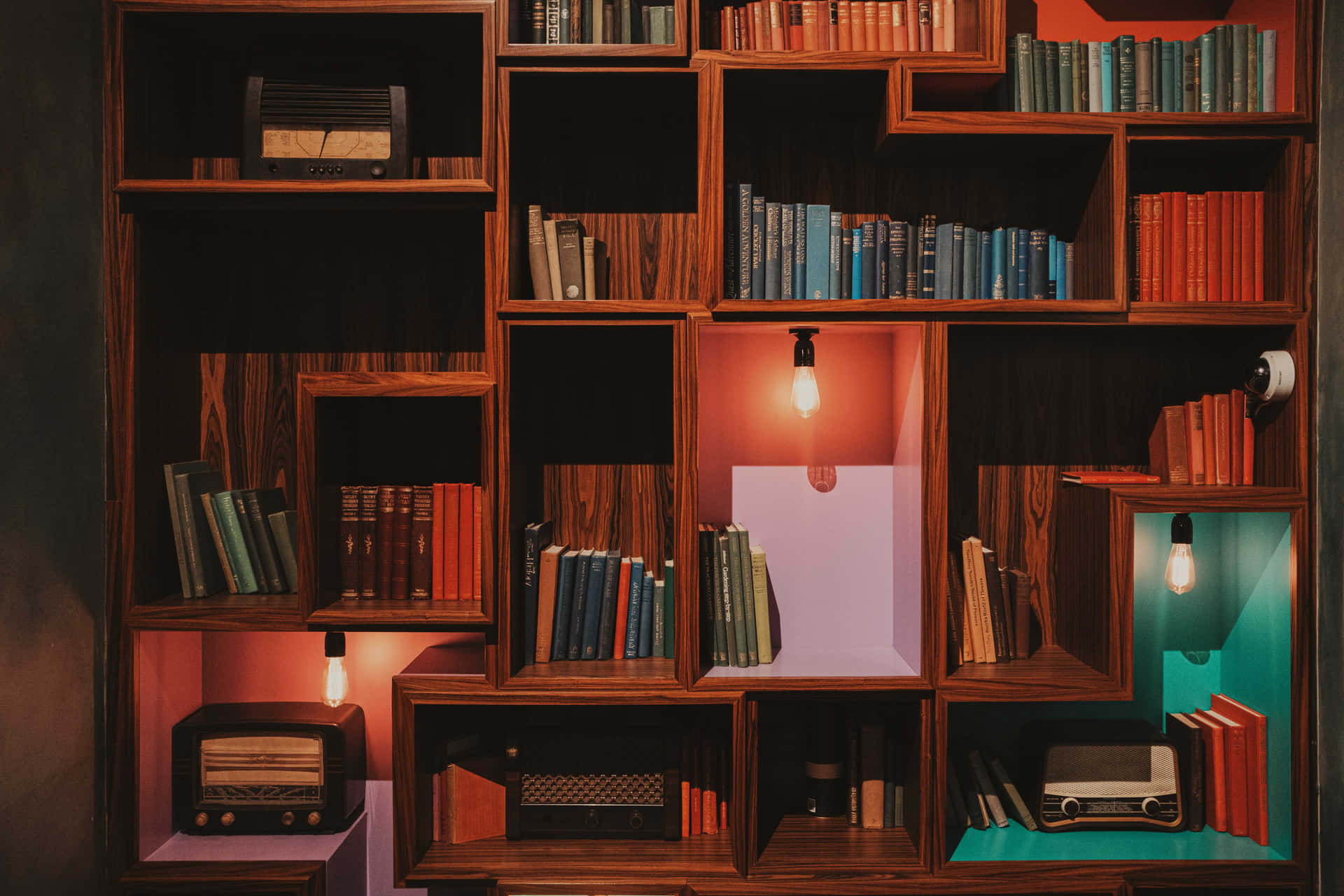 A Room With A Colorful Bookcase And A Radio