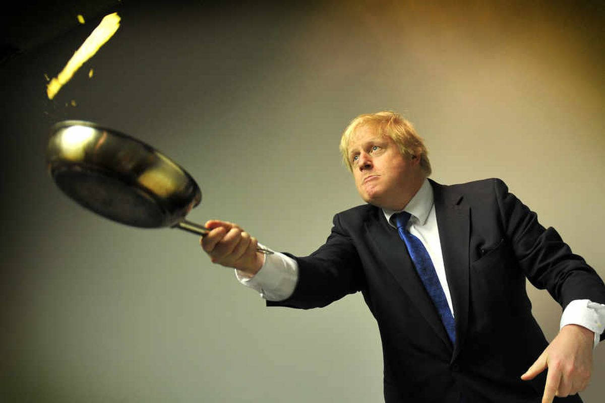 Boris Johnson Holding A Pan Wallpaper