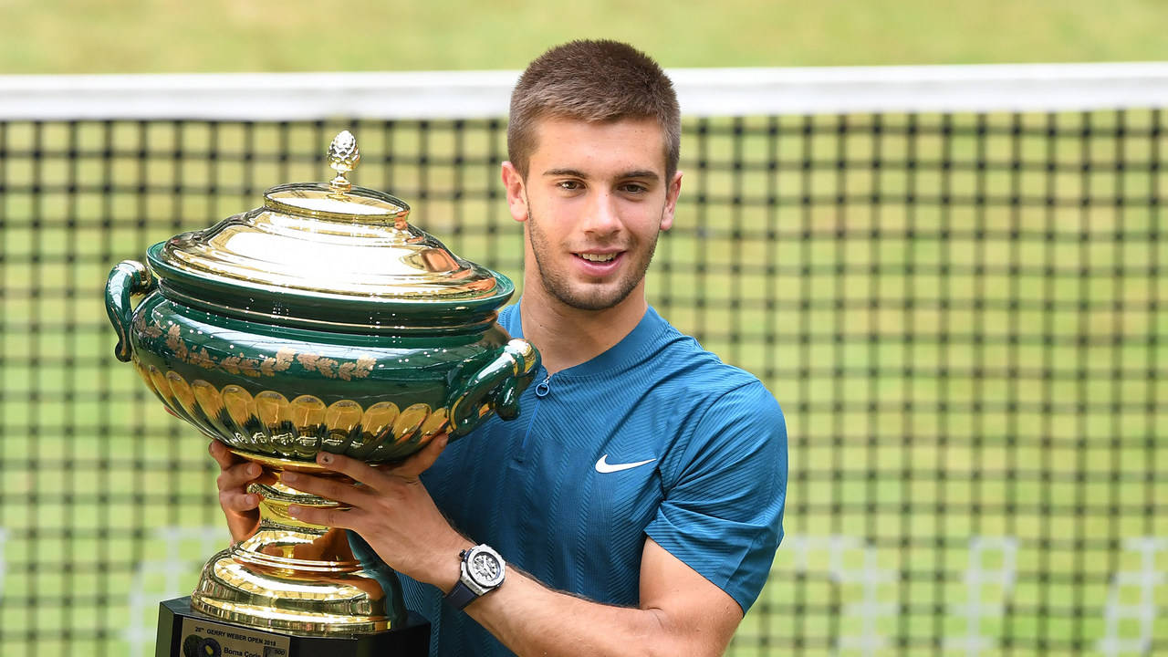 Borna Coric With Trophy Wallpaper