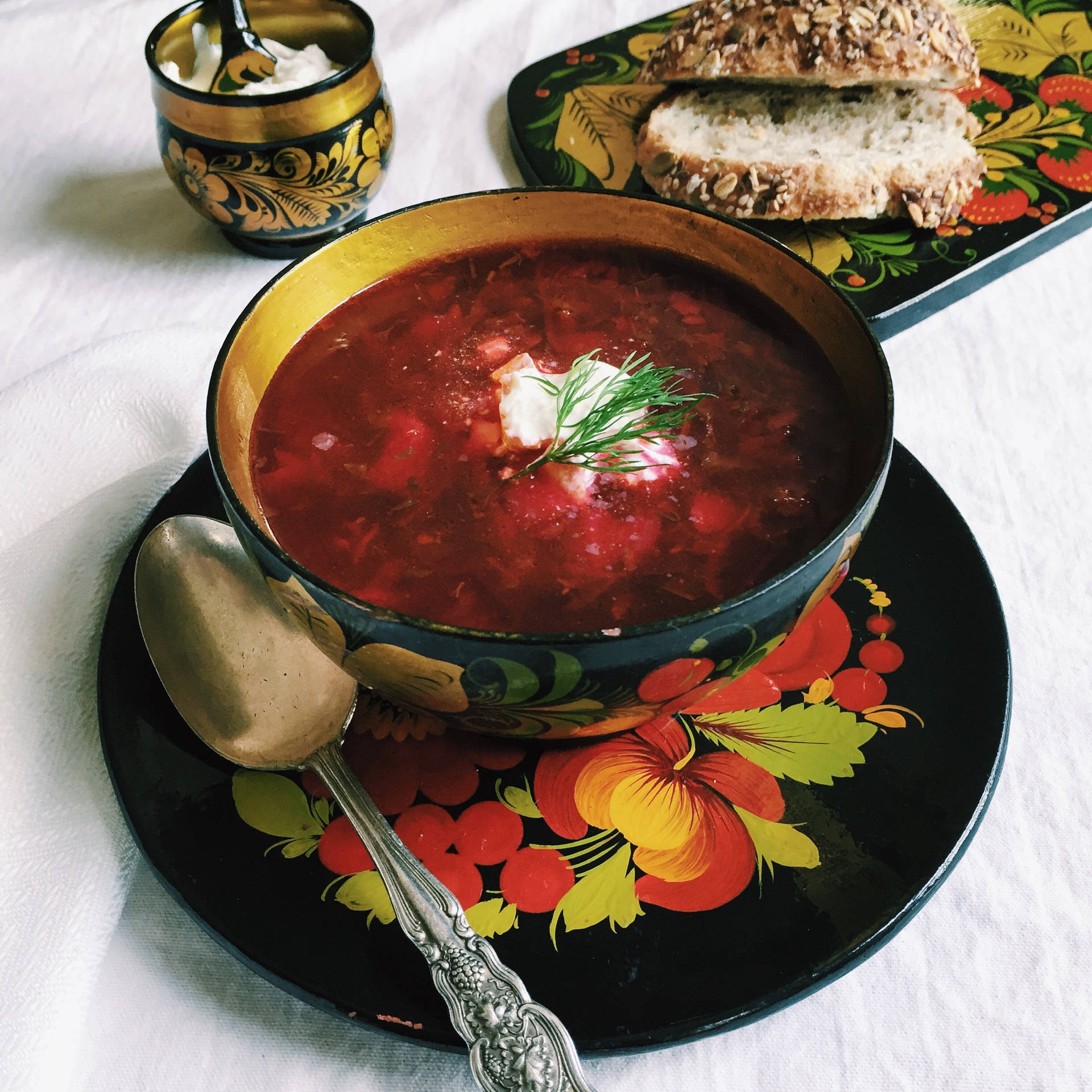 Delectable Borscht Soup Served with Crust Wheat Bread Wallpaper