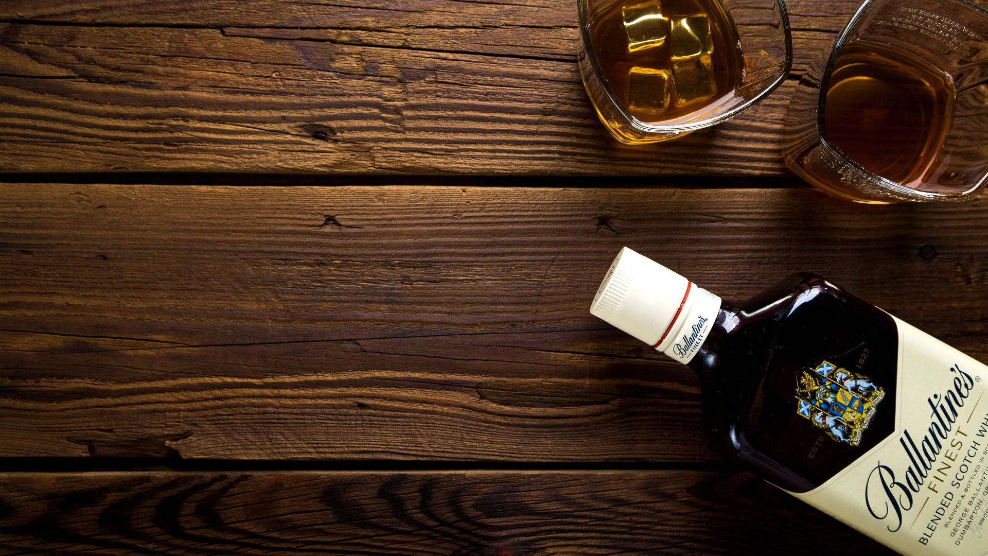 Bottle And Glasses Of Alcohol On Wooden Table Picture