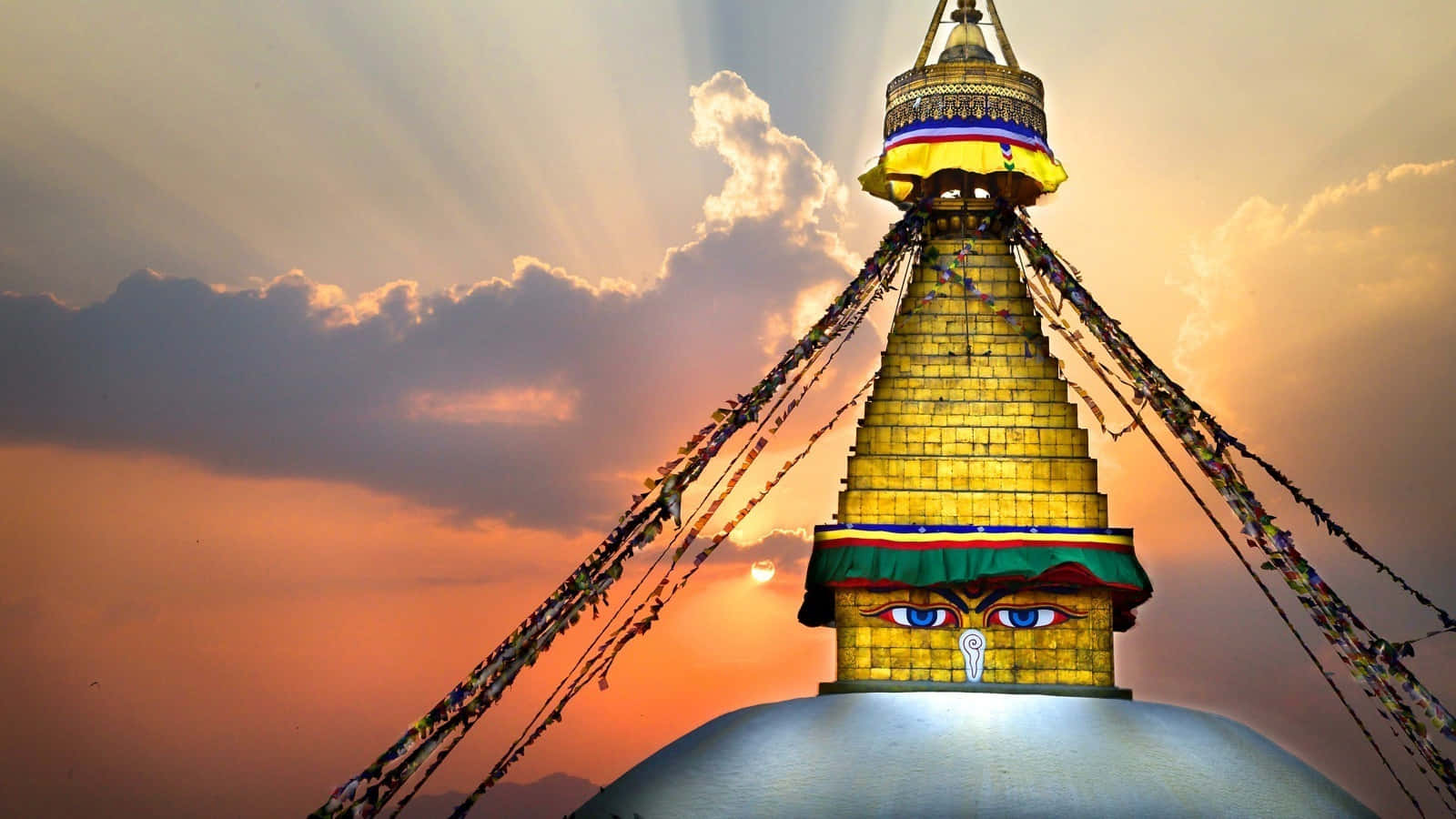 Buddhaen Boudhanath Stupa Edition tilføjer et beroligende tema til din skærm. Wallpaper