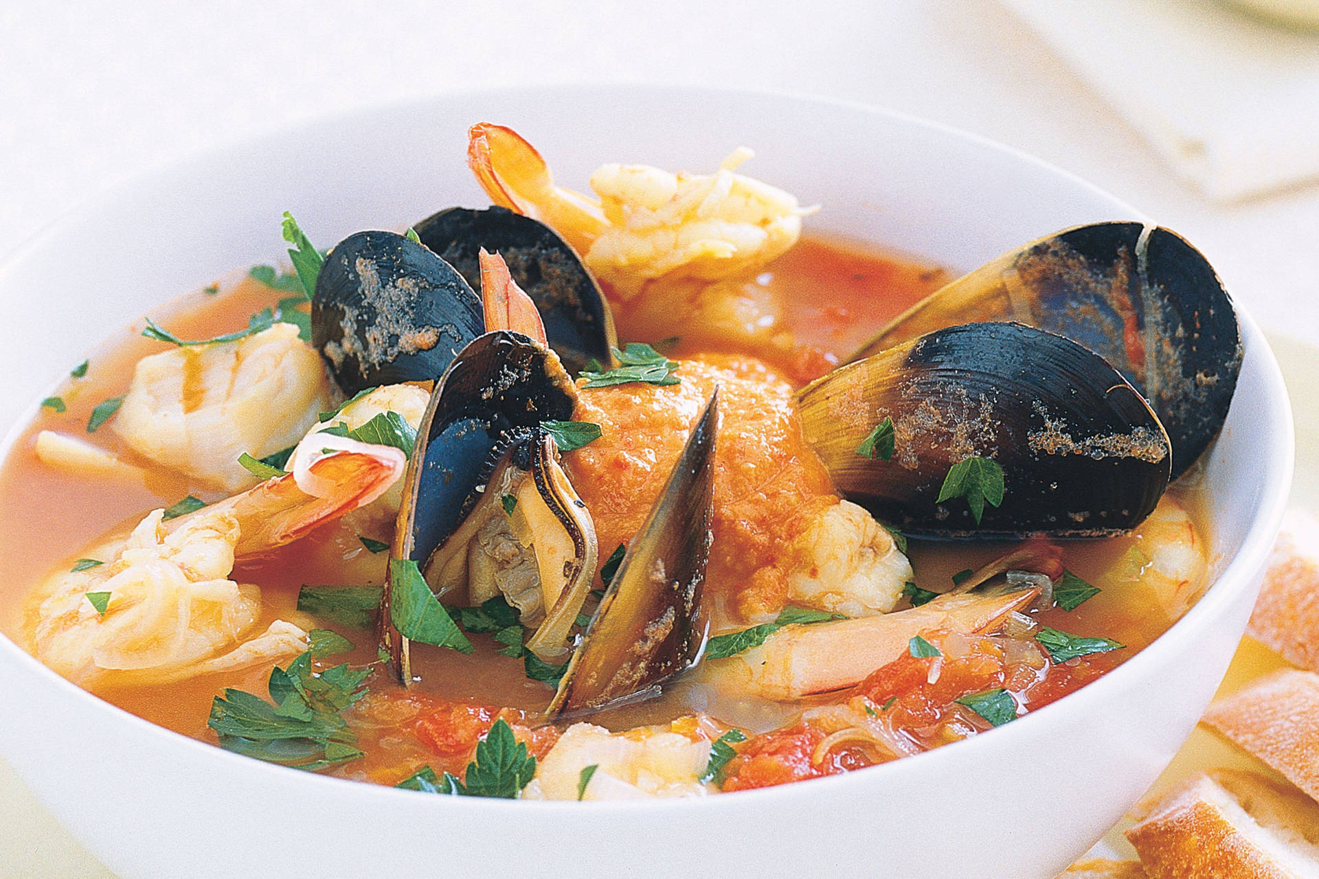 Caption: Authentic French Bouillabaisse Served in a Ceramic Bowl Wallpaper