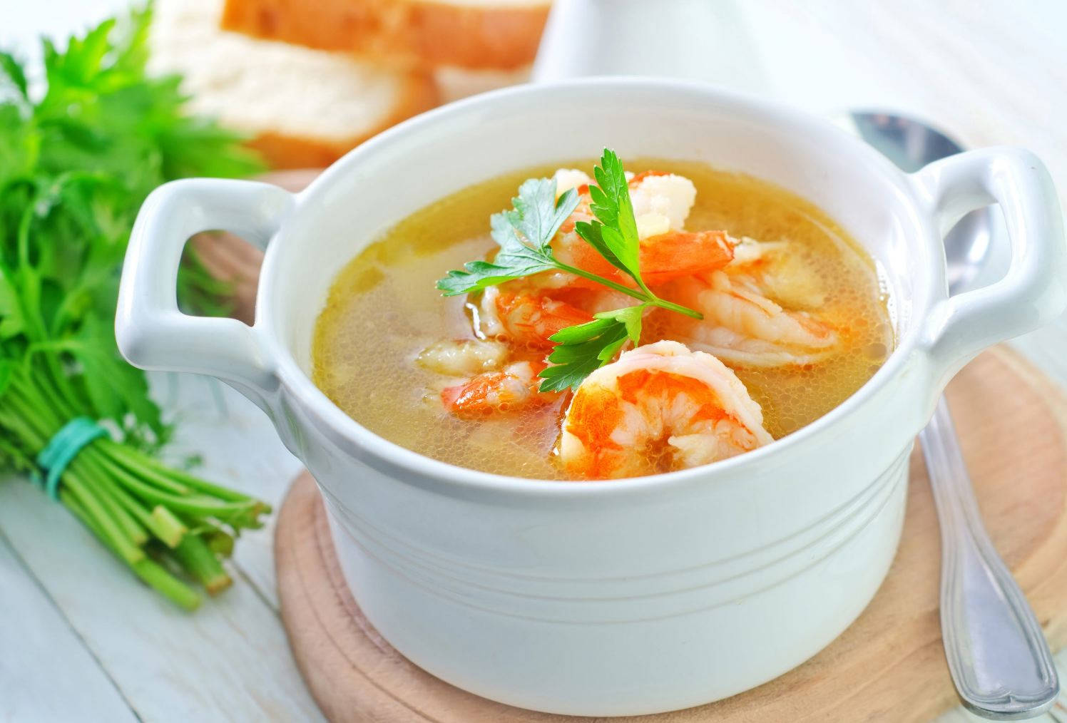 Bowl Of Tom Yum Soup With Parsley Wallpaper